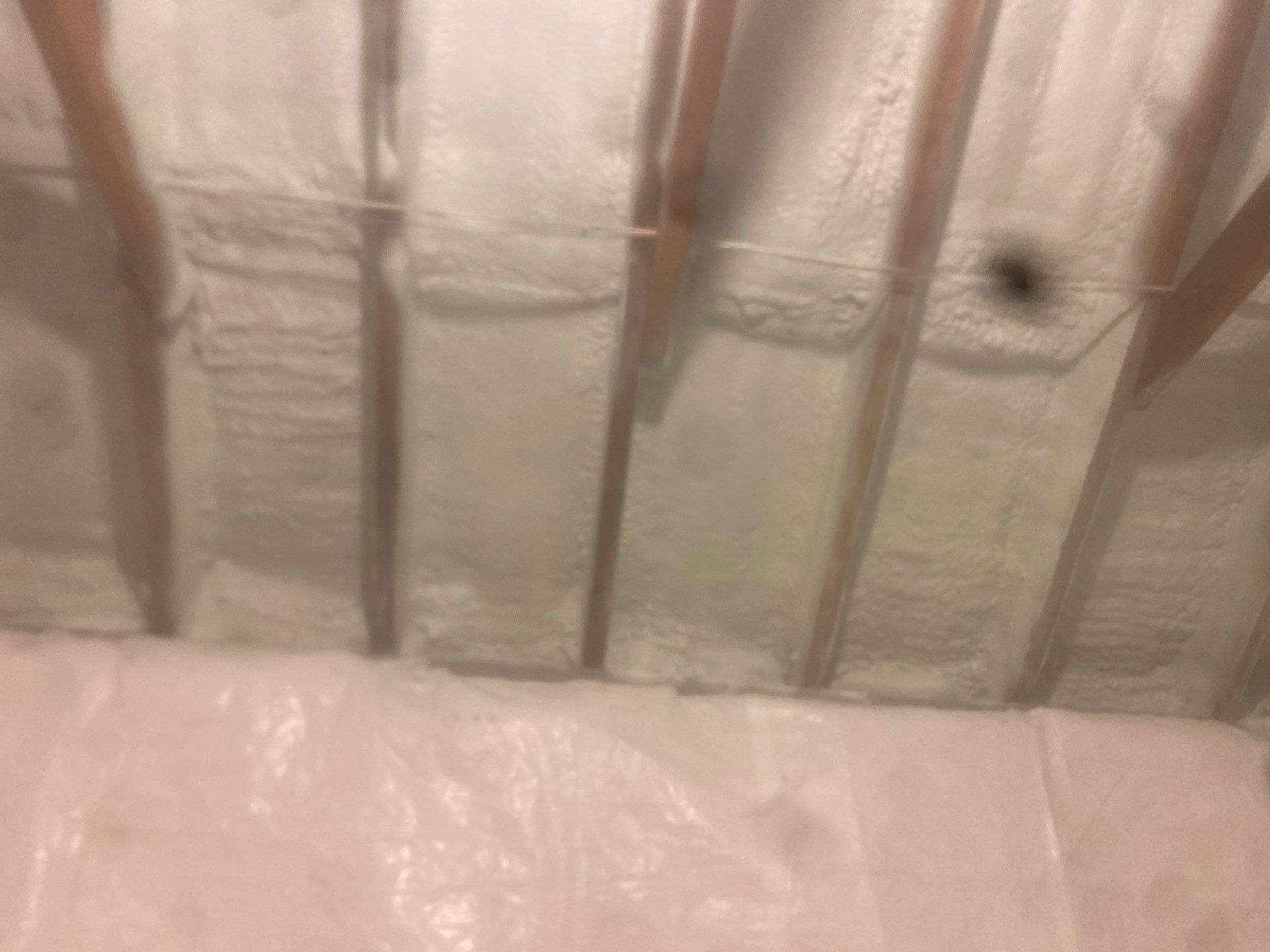 Attic Retrofit using open cell spray foam by NYS Foam & Energy