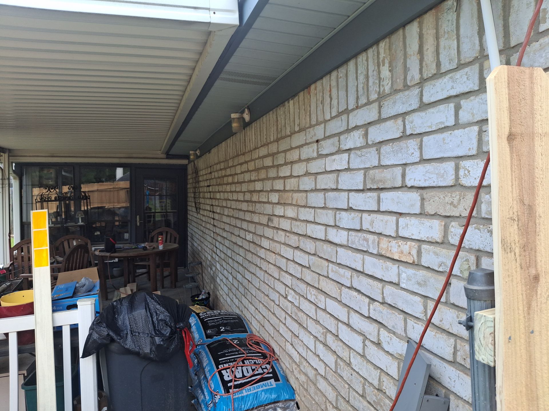 Exterior Refresh Brick Painting Job in Overton, TX by Quality Coats Painting