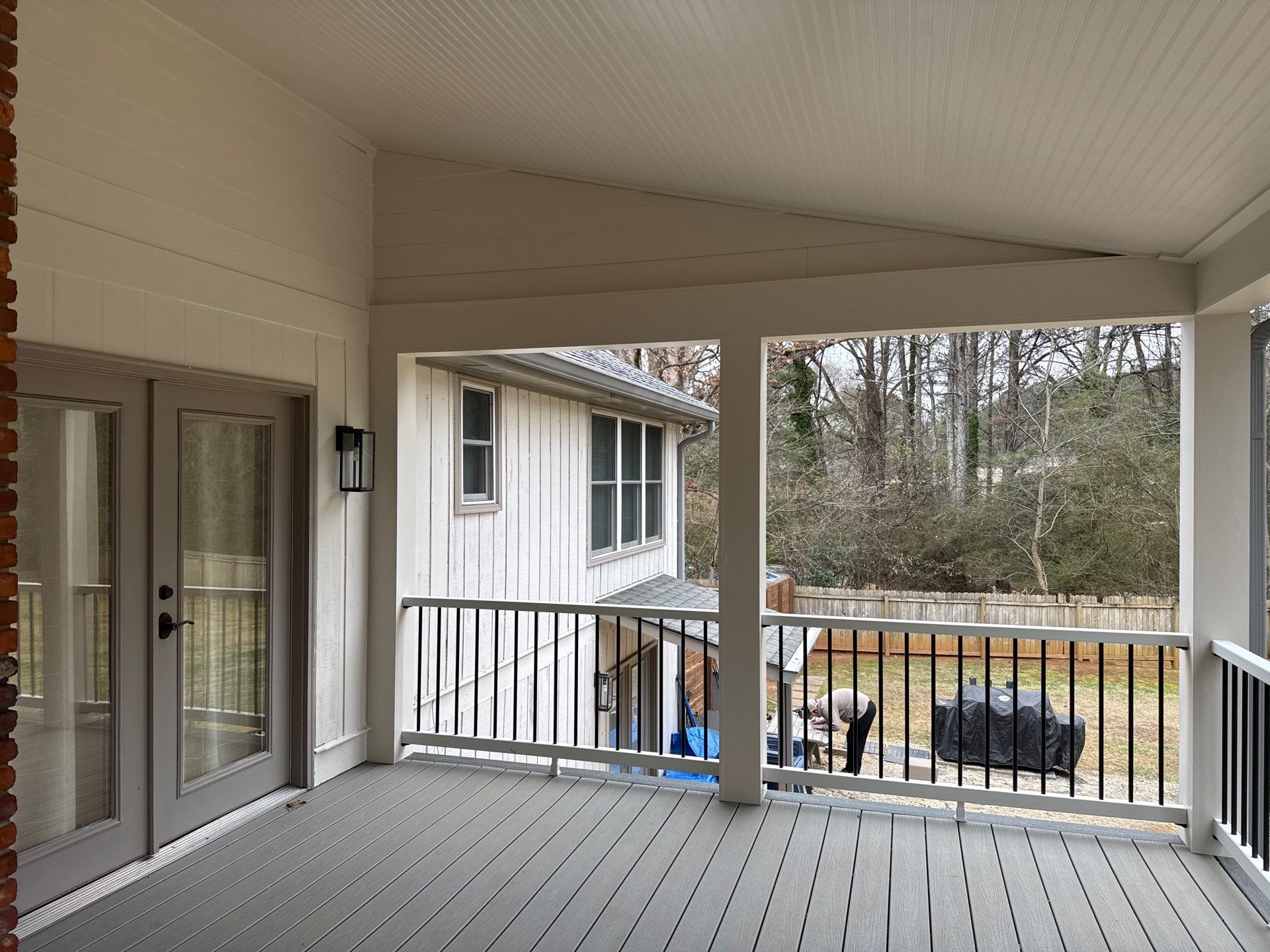 Deck and Shed Roof Style Covered Build using Trex Decking Products by Nelson Exteriors 