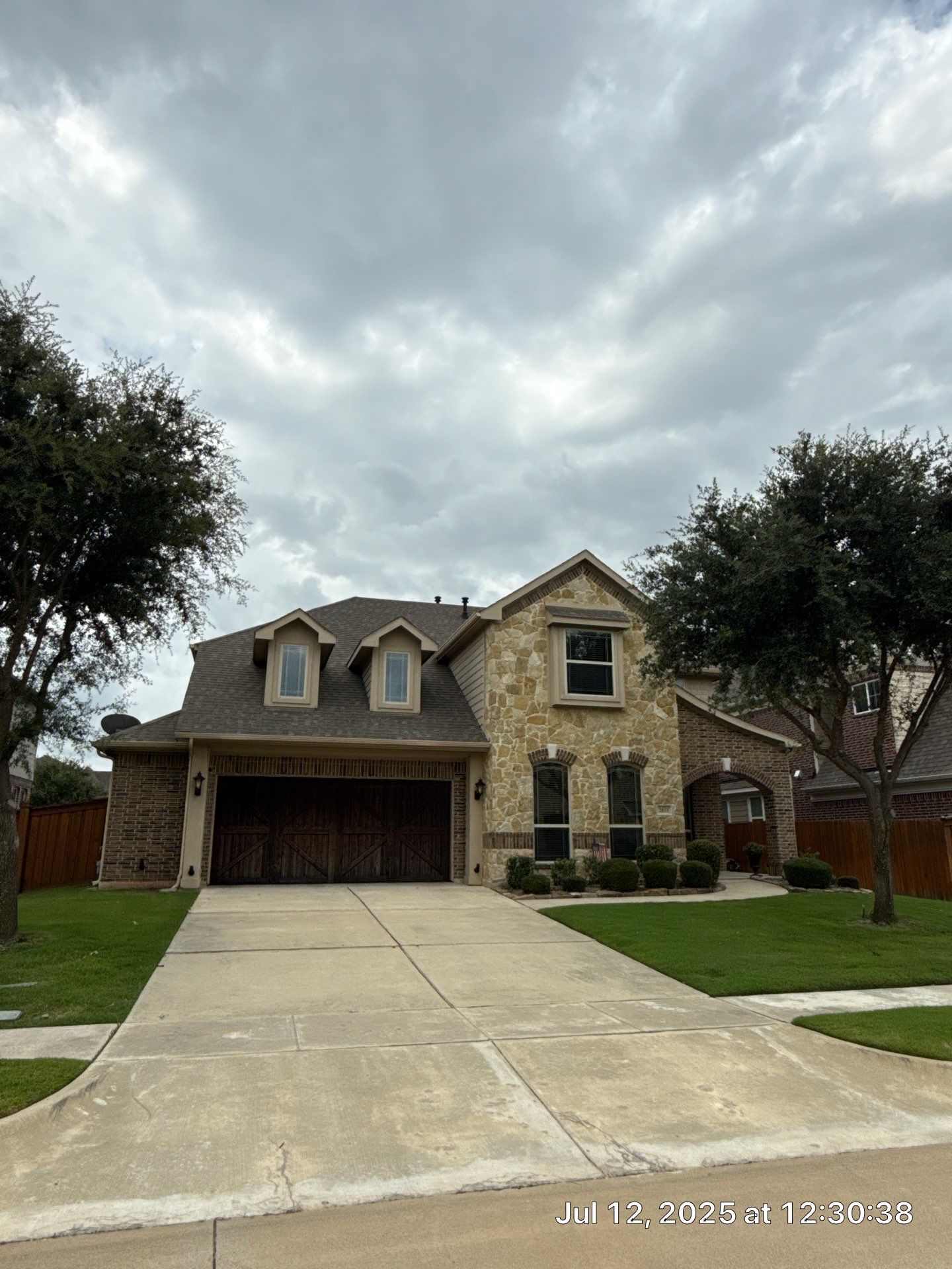Residential Roof Replacement using ATLAS PROLAM WEATHER WOOD by Elite Roofing LLC