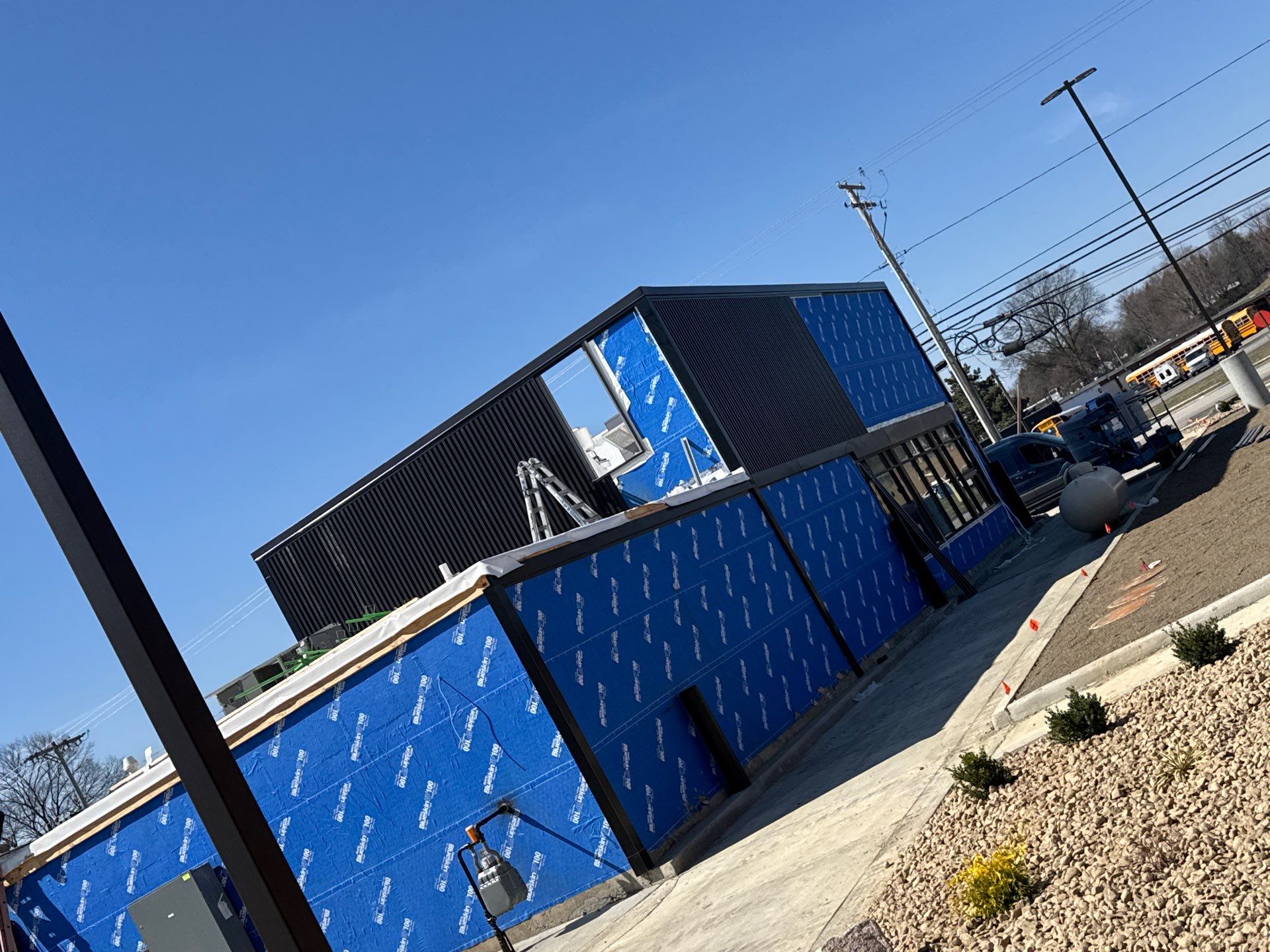 Commercial Roofing Installation using Duro-Last 50 mil PVC by 3 Daughters Construction 