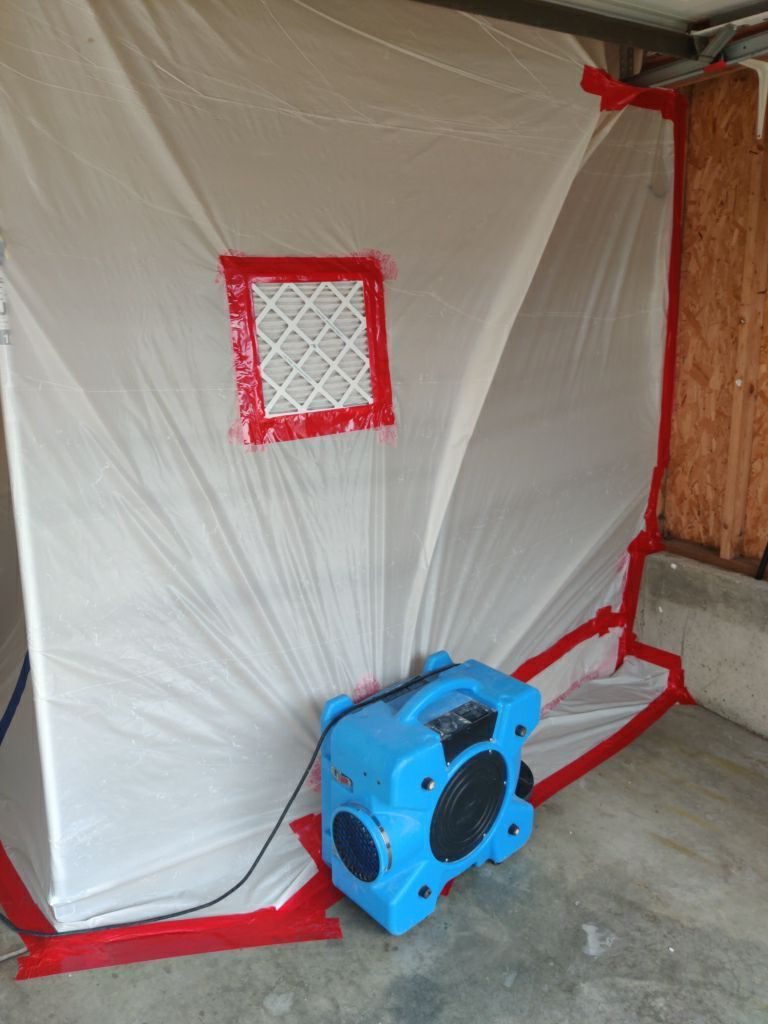 Water Damage in Garage by Accountable Home Services