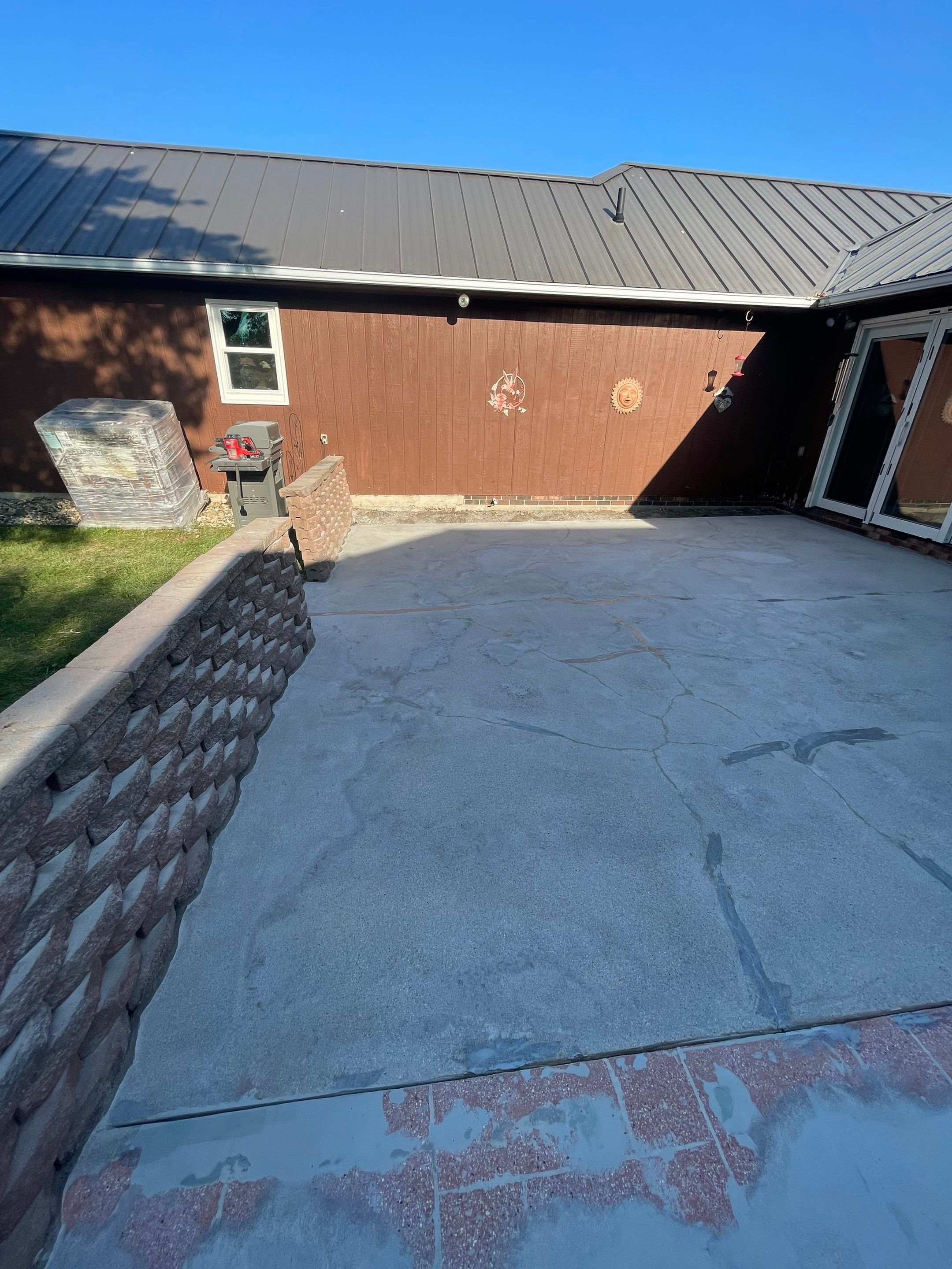 Concrete Patio Resurfacing and Protective Coating in Winfred, South Dakota by Select Painting, Coatings & Garage Cabinets