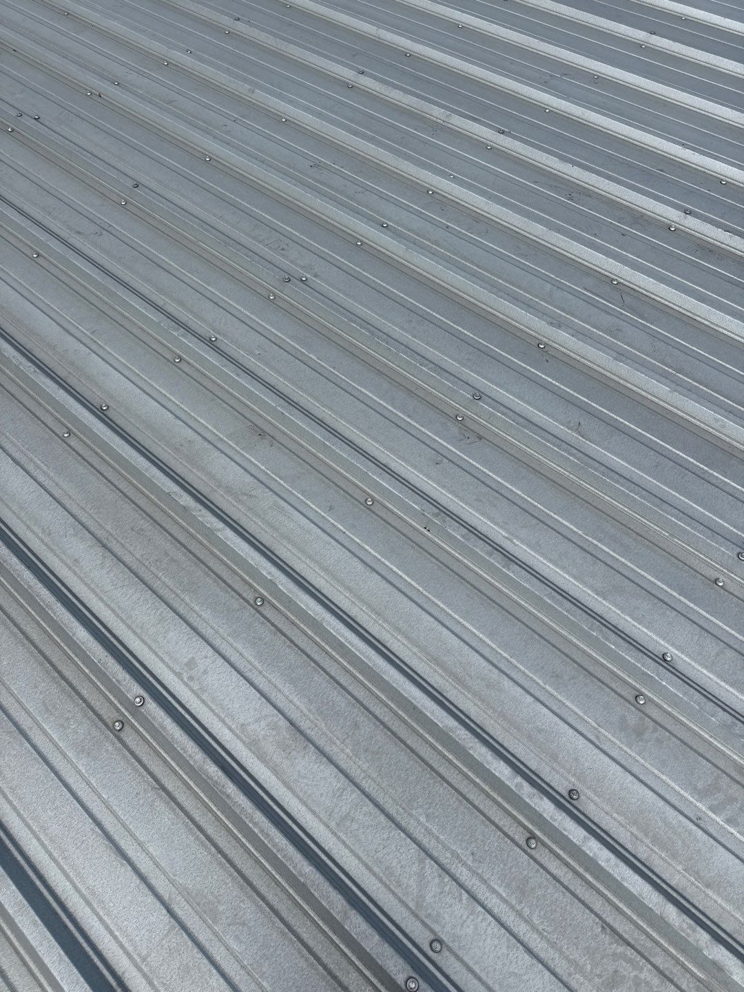 Metal Roof Fastener Replacement and Seam Sealing in West Point, NE by Crows Roofing LLC