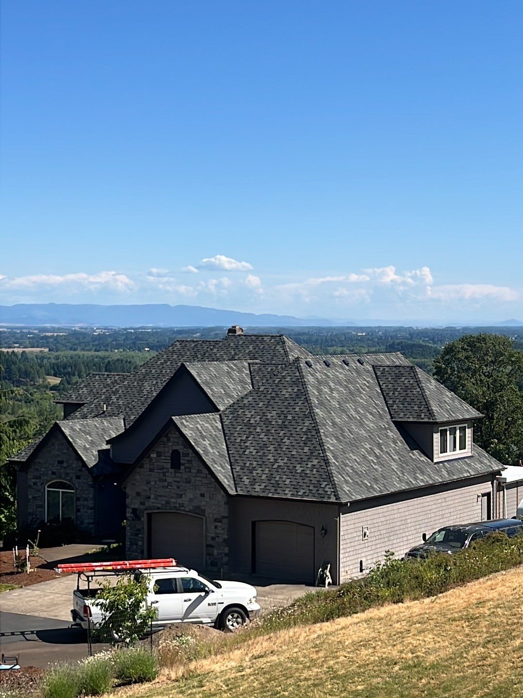 Residential Roofing Installation using Malarkey Windsor 50 Year Shingle (Color: Storm Grey) by Orezona Building & Roofing Company, Inc.