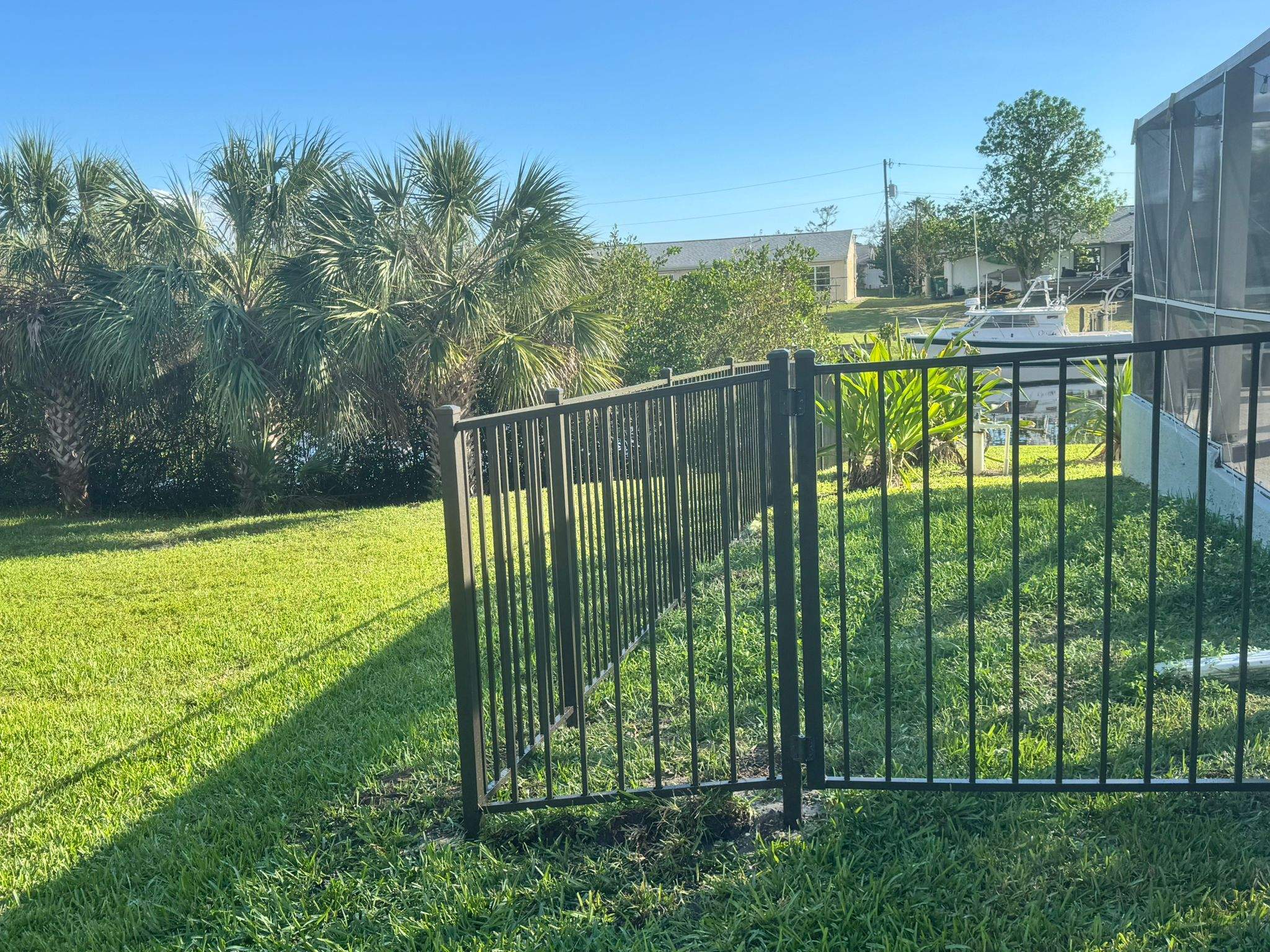 Bronze Aluminum Picket Fence Installation in Port Charlotte by True Fence LLC