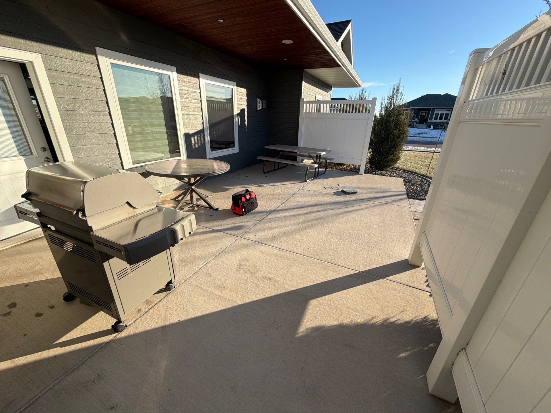 Polyurea Patio Floor Coating in Starry Evening for Sioux Falls Home by Select Painting, Coatings & Garage Cabinets