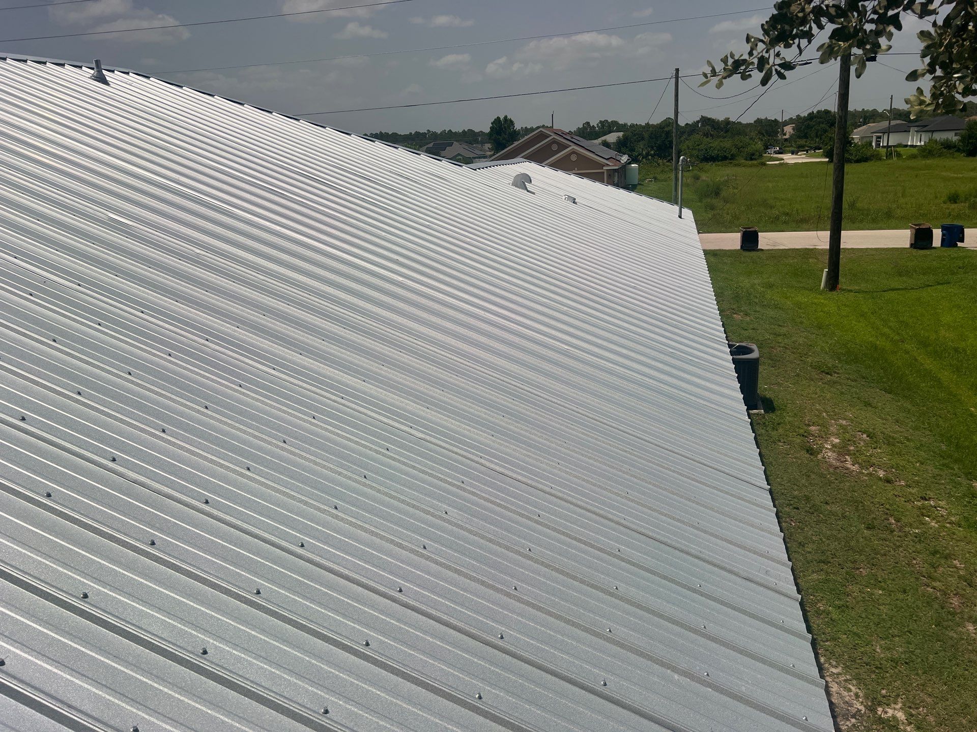 Residential Roofing Installation using Galvalume Classic Rib by Durabilis Roofing INC