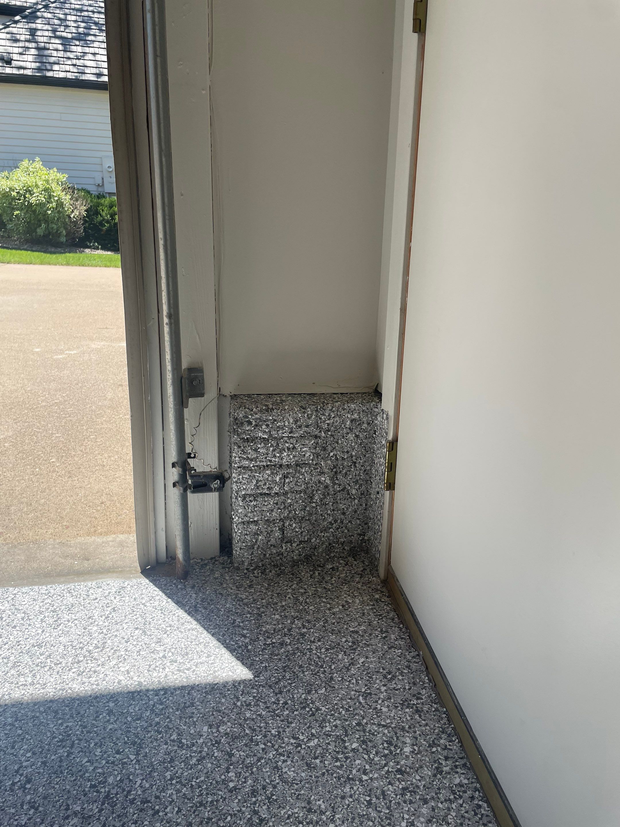 Gray Speckled Epoxy Garage Floor Coating in Sioux Falls by Select Painting, Coatings & Garage Cabinets