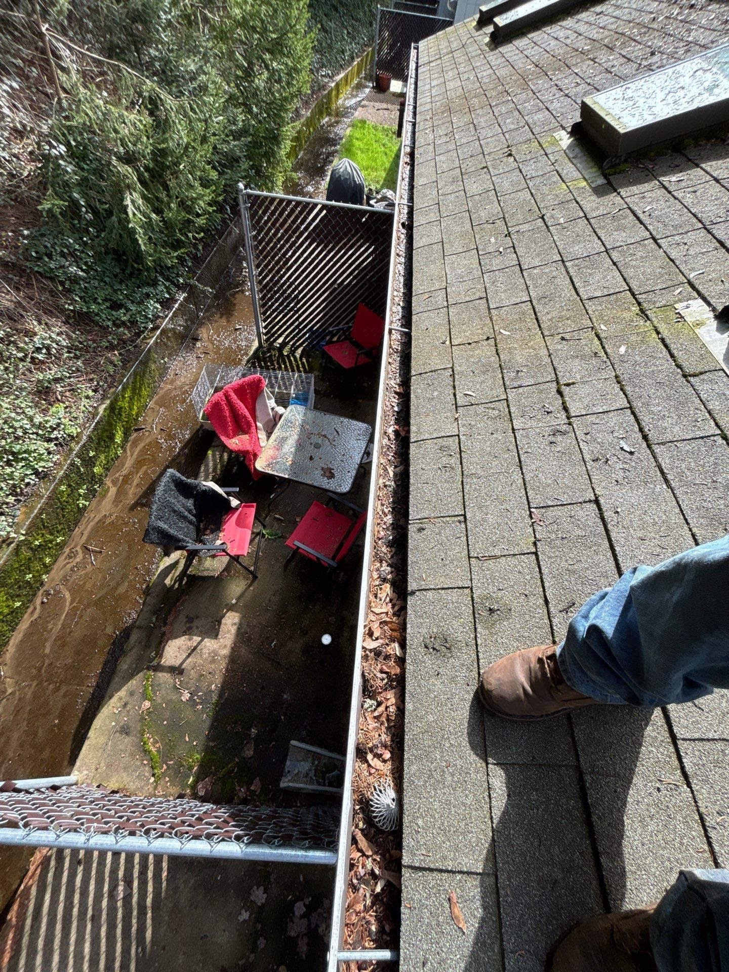 Commercial gutter cleaning Salem, OR before photo with filled gutters