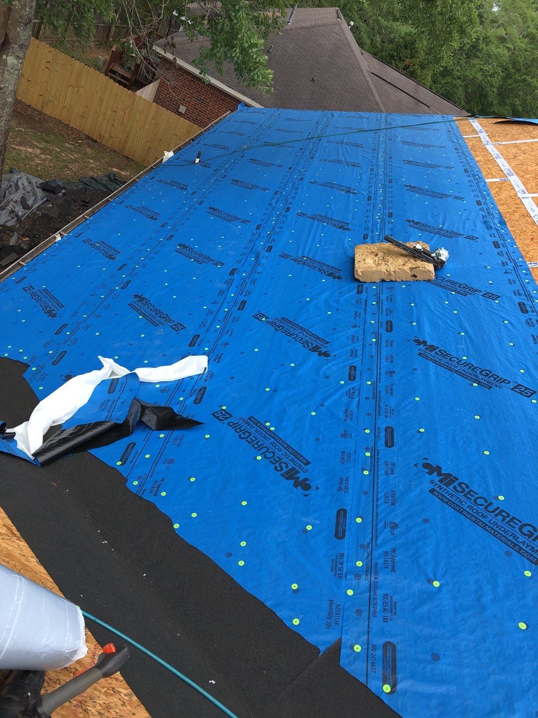 Residential Roofing Installation using Roof Replacement by American Roofing & Construction LLC