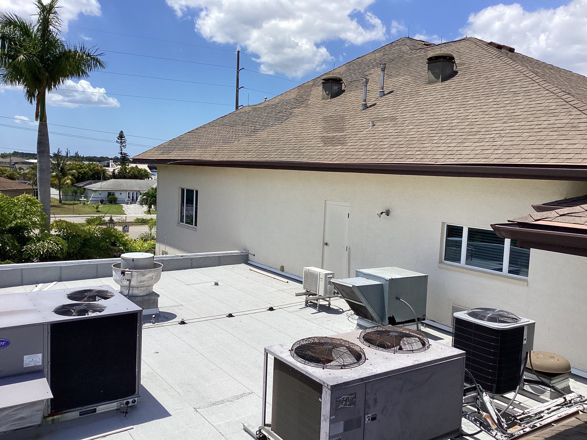 Musket Brown Seamless Gutters using Musket Brown Seamless Gutters in Capen Coral FL by Gutter Professors