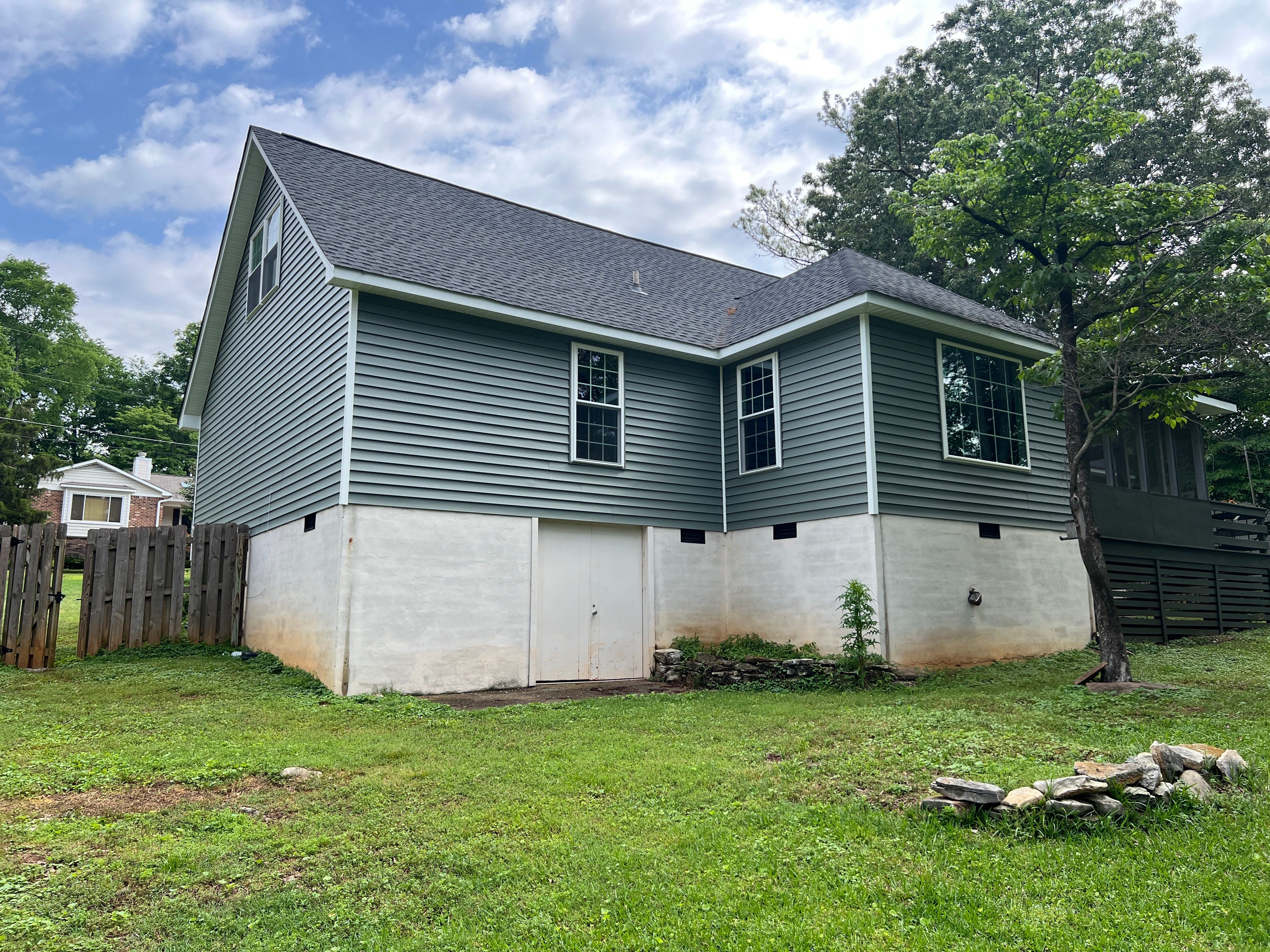 Siding Replacement using Mastic Carvedwood Vinyl Plank by Freedom Exteriors