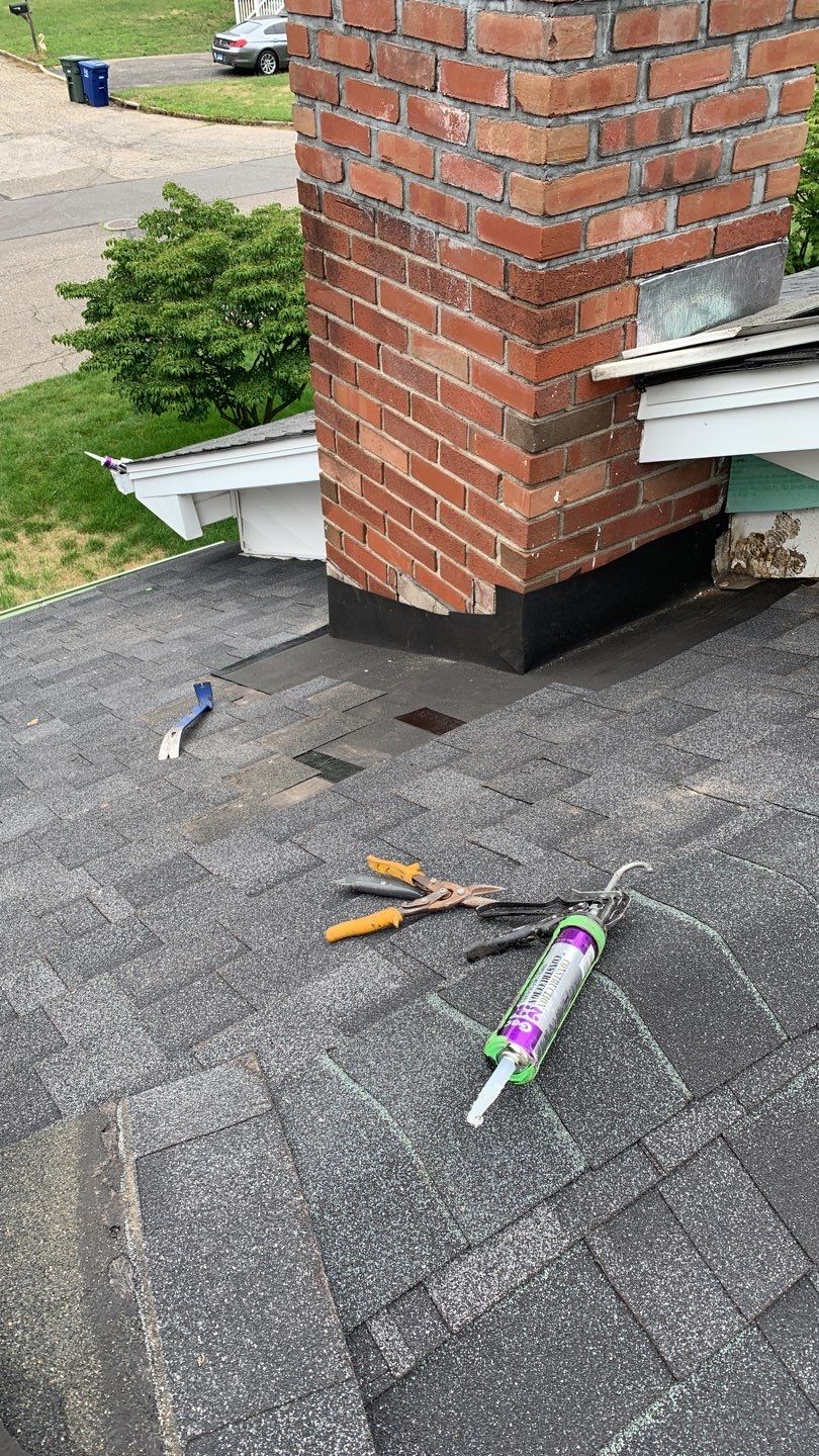 Residential Roofing Repair using Chimney Flashing by A Plus Exterior