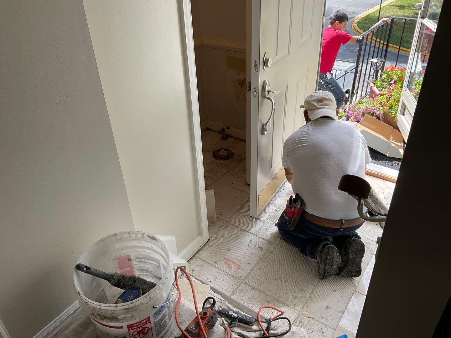 Bathroom Remodel using Two new bathroom design and new floors by Alpha Design Services