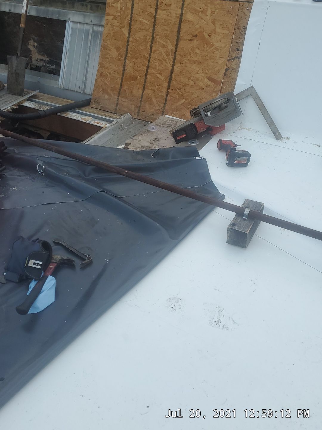 Commercial Roofing Installation using 50 mil PVC by Hostetler Roofing