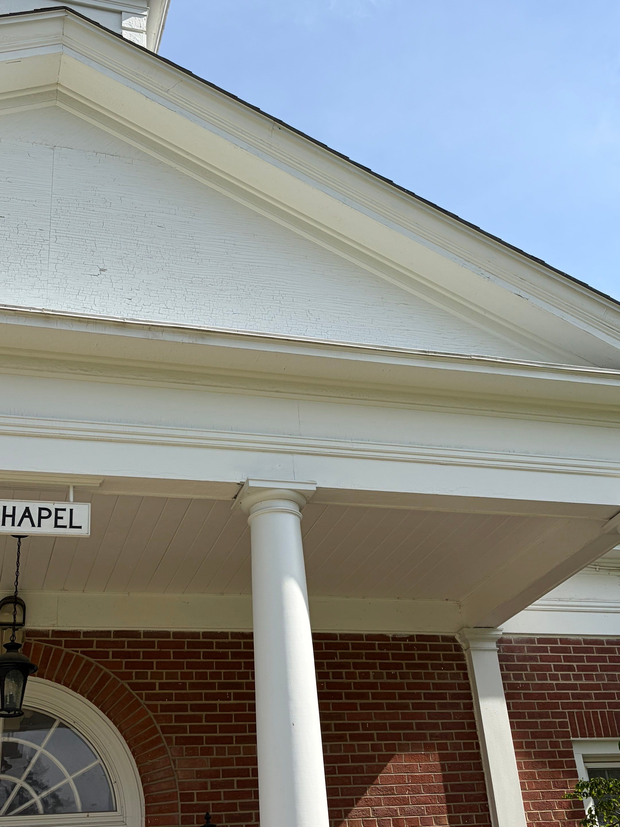 Commercial Wood Trim Restoration and Gutter Replacement in Birmingham by Top Shelf Painter