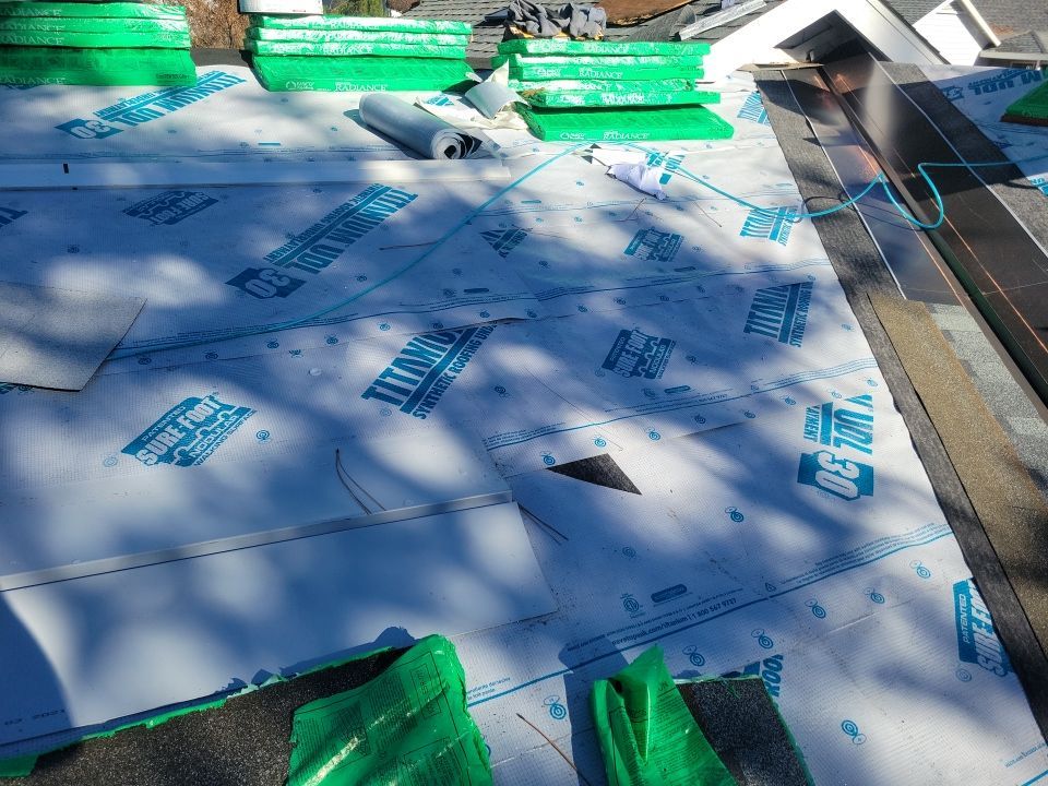 Attic Insulation, Roofing, and Solar for this in-town home by Byers Enterprises 