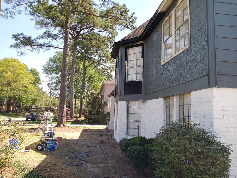 Interior and exterior painting project by Roof Concepts Construction