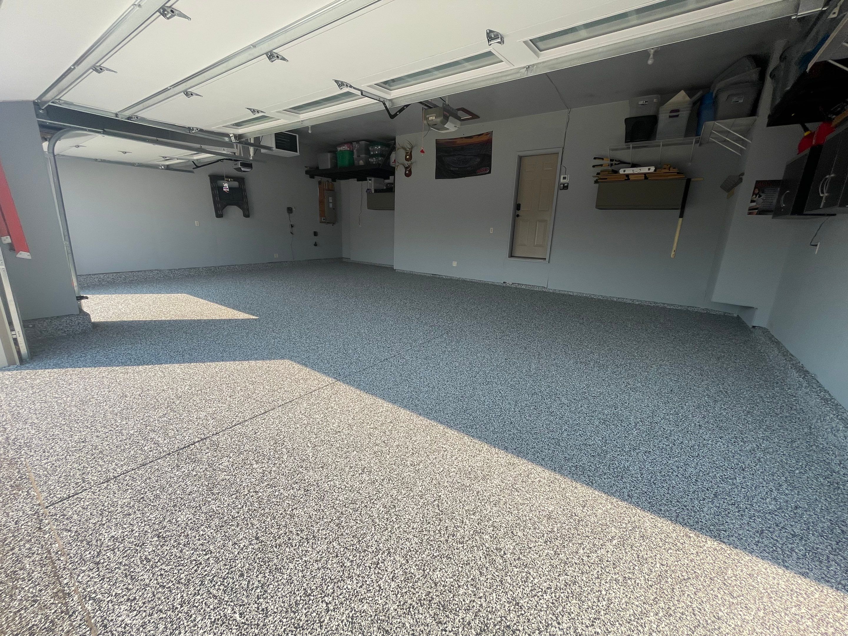 Sioux Falls Garage Concrete Coating Installation with Domino Flake by Select Painting, Coatings & Garage Cabinets