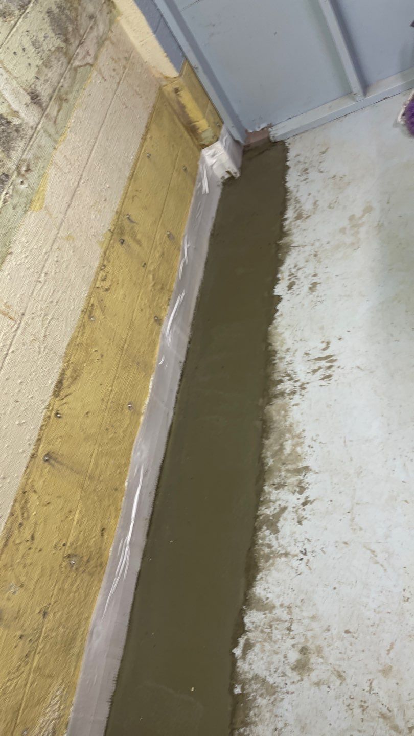 Interior Waterproofing Using GrateDrain™ Products by Toledo Basement Repair