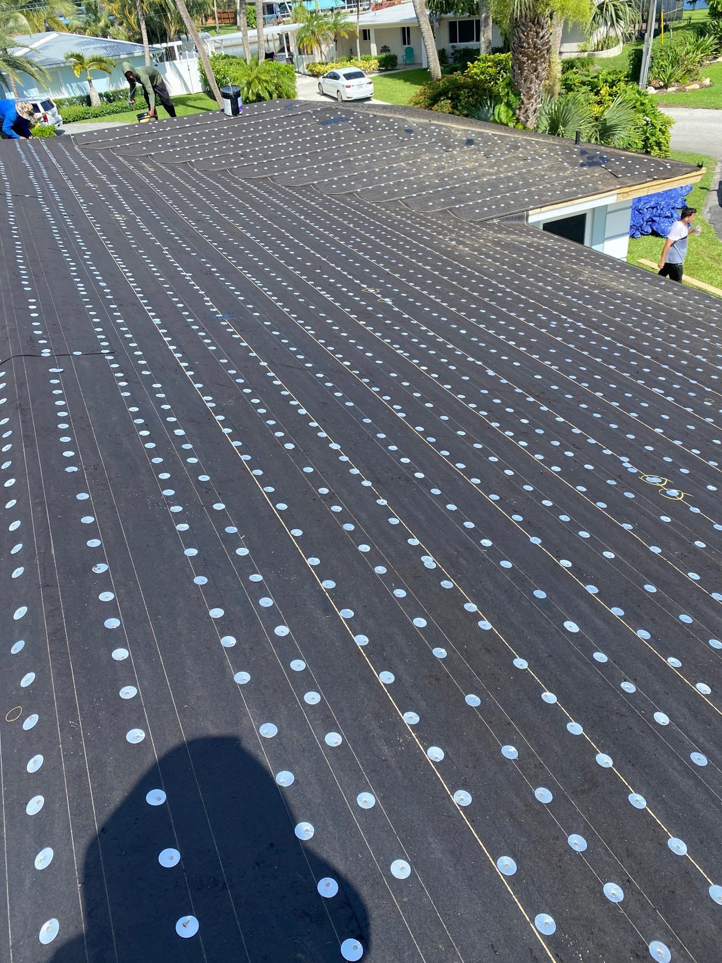 Residential Roofing Installation using 1" Nail strip metal roof by BLUES BROTHERS ROOFING