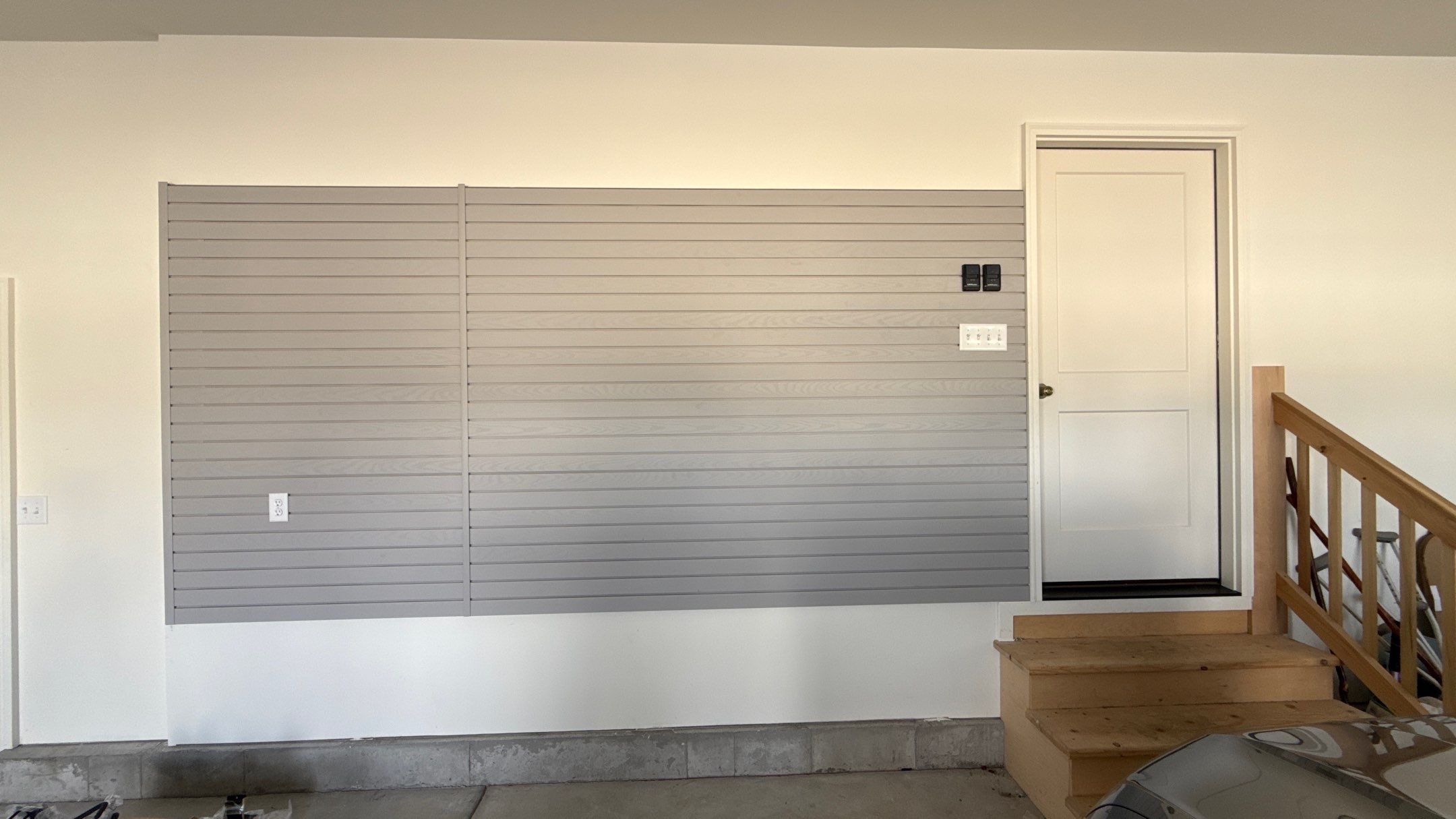 MKE Textured Grey Slatwall Creates A Perfect Storage Start  by Banner Garage