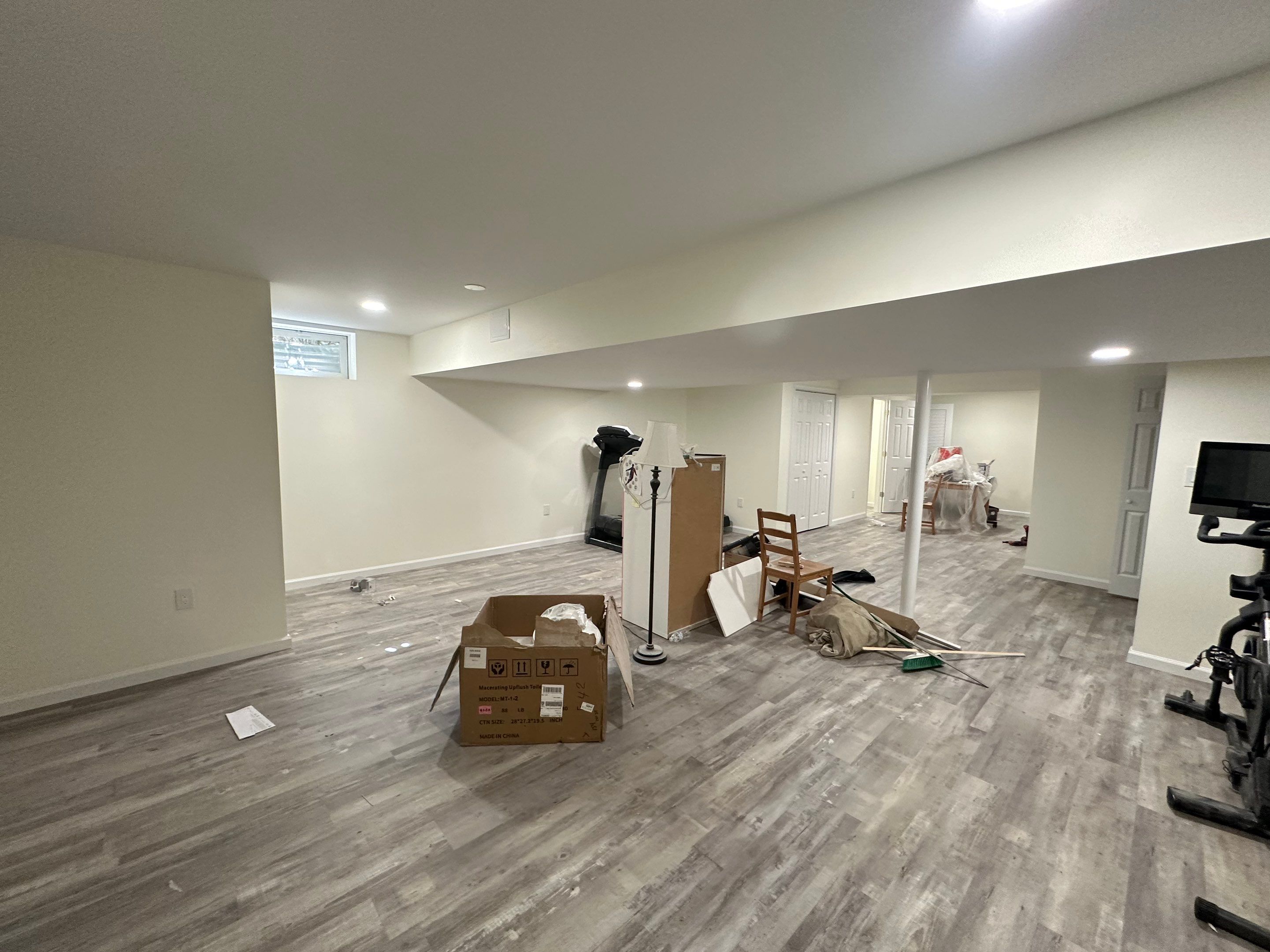Basement Remodel using Wood by Home Concepts Construction