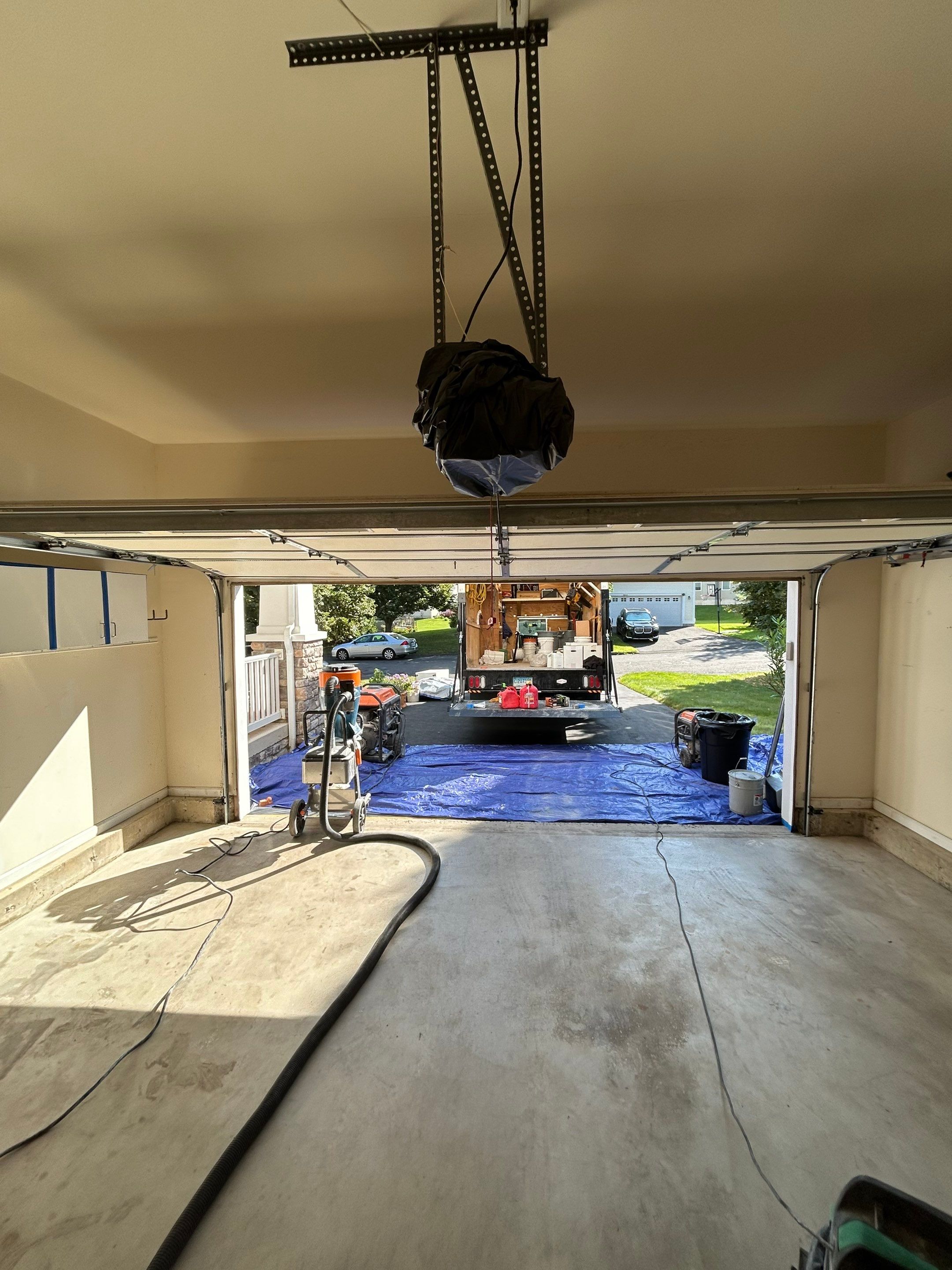 Concrete Floor Coating Using Gravel Color by DiGiorgi Roofing and Siding Inc