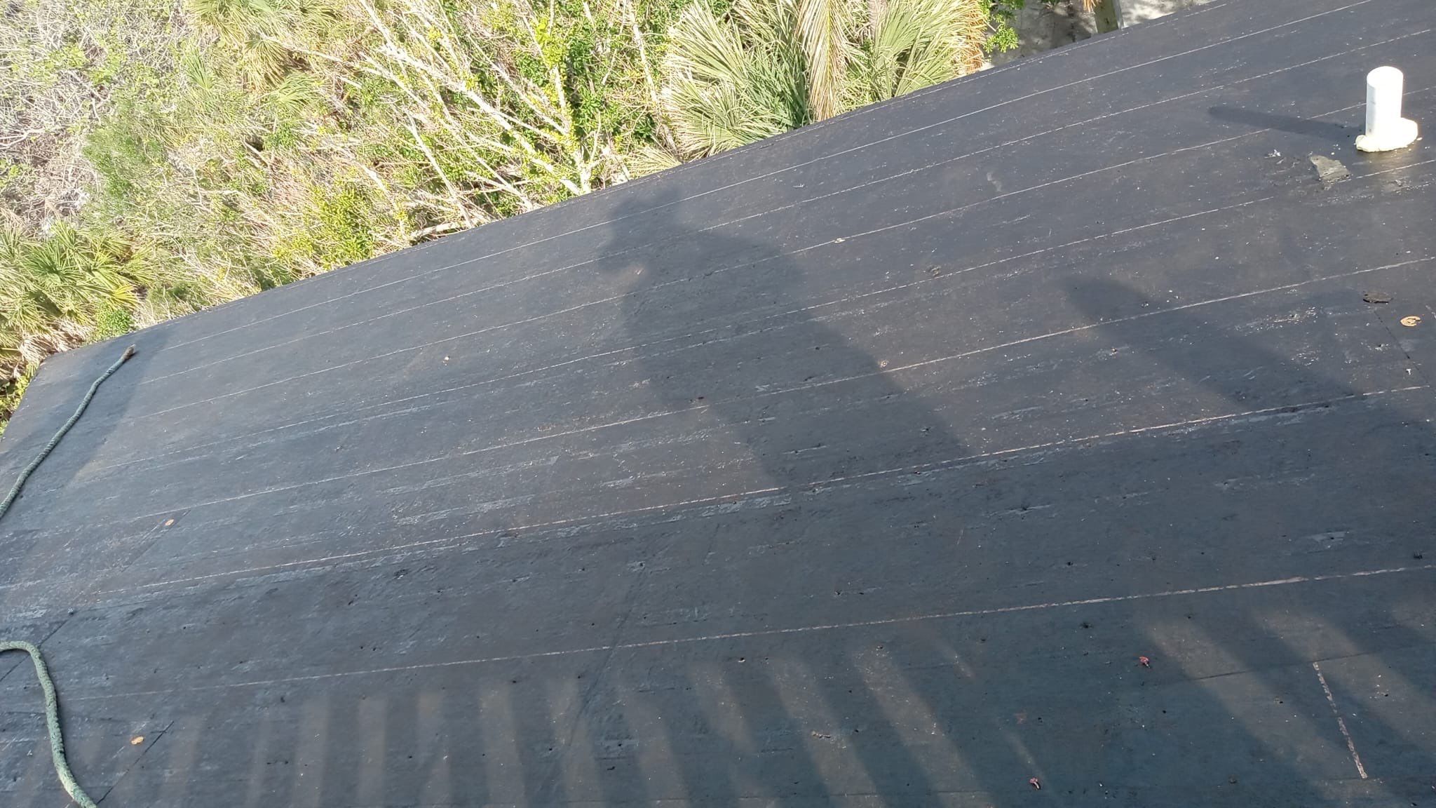 Residential Roofing Installation using Gulf Coast Metals Gulf Seam Panels by Four Peaks Roofing