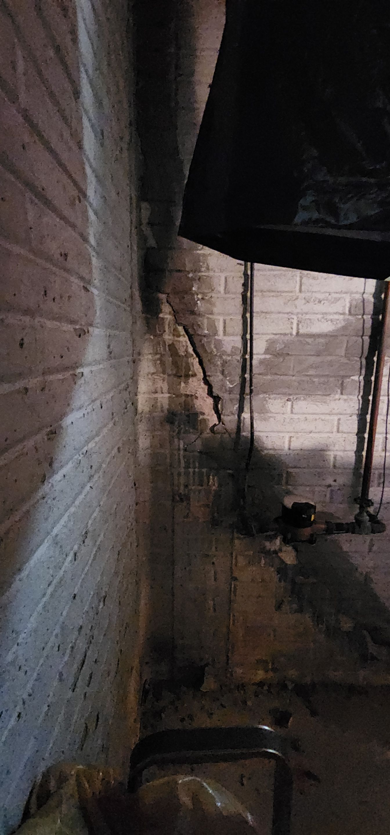 Helical Piers and Pillar Lift using Helical Foundation Footings by Toledo Basement Repair