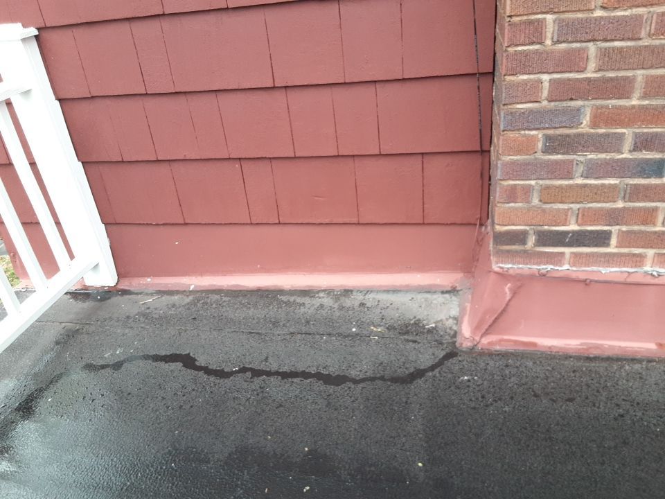 Residential Roof Replacement using Patio Roof by Absolute Roofing and Construction