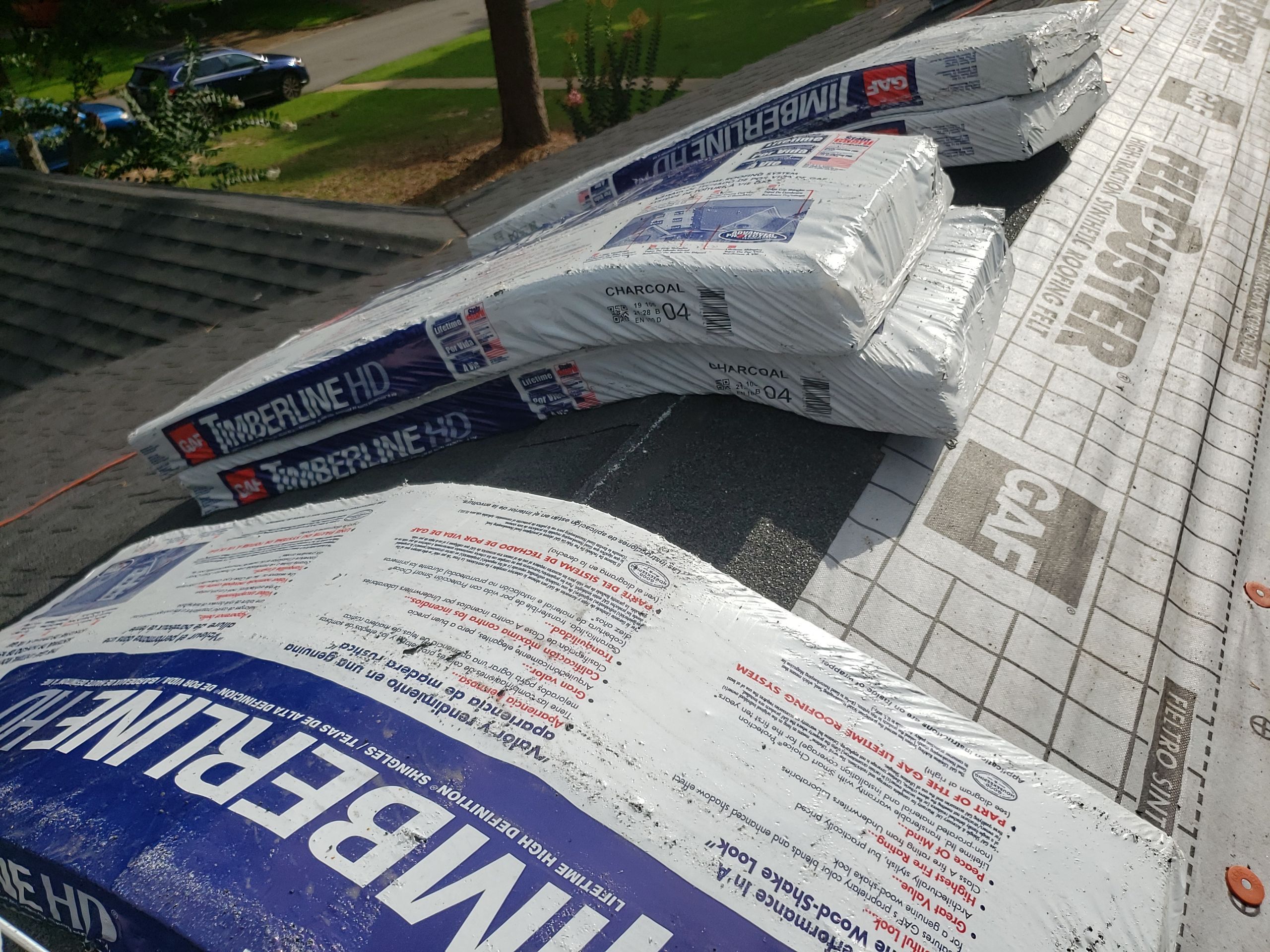 Residential Roofing Installation using Roof Replacement by American Roofing & Construction LLC
