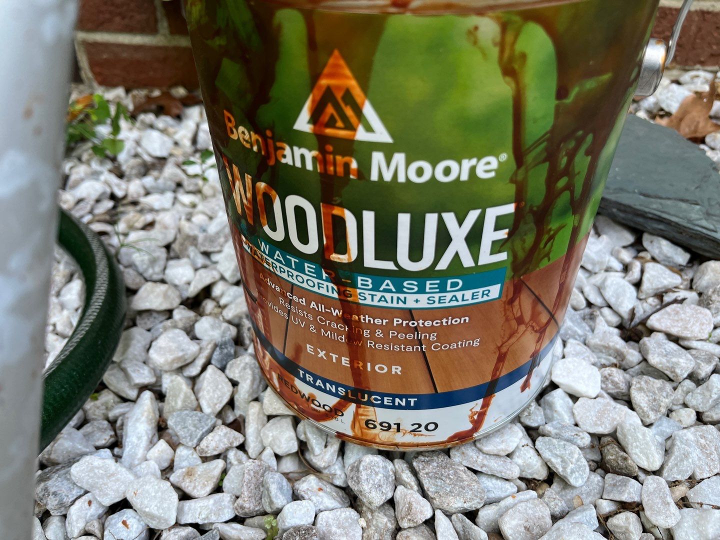 Triple deck re-staining by AKK Painting LLC