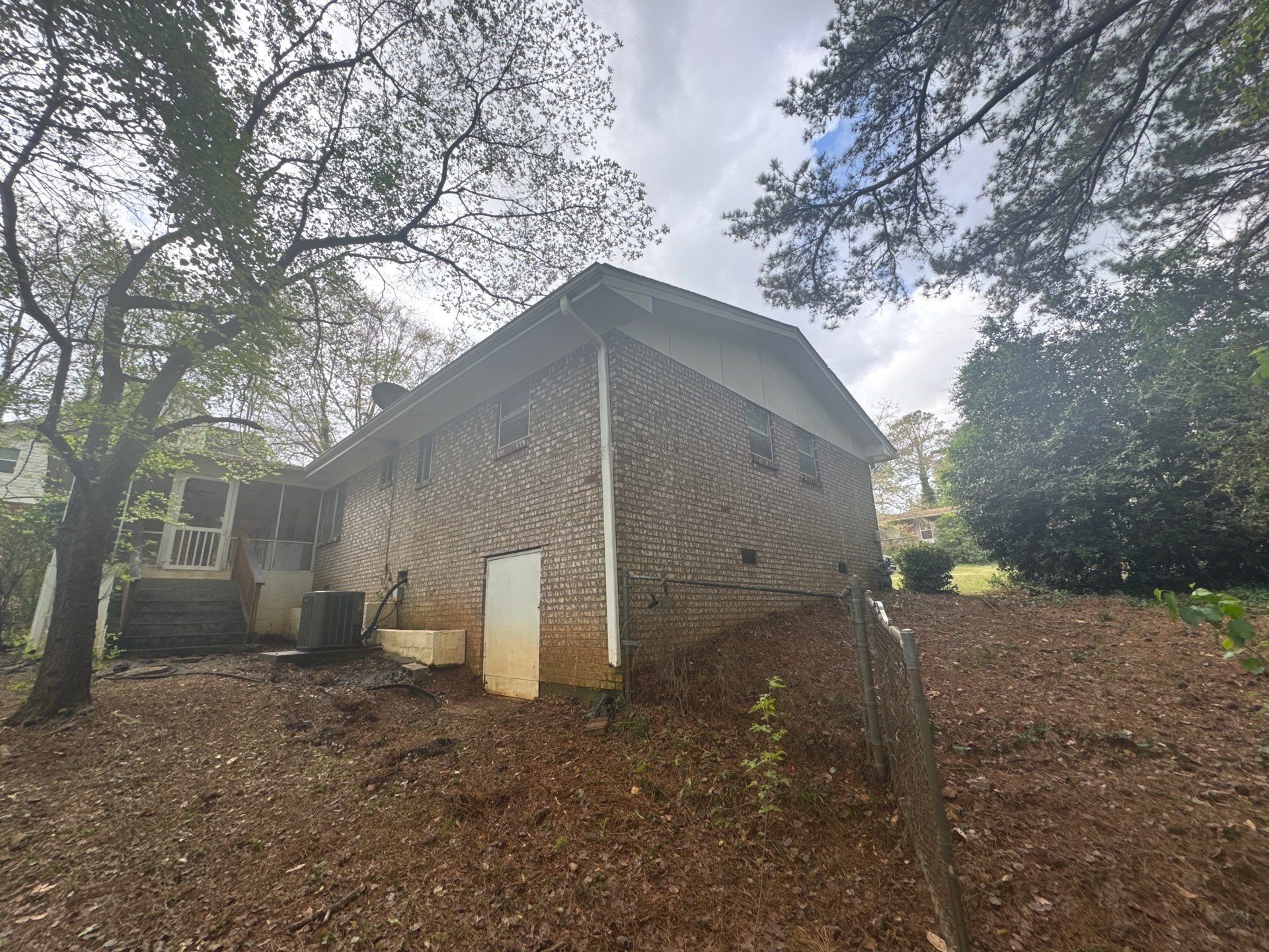 White Brick Exterior Painting and Shutter Refresh in Marietta by Swift Home Renovations