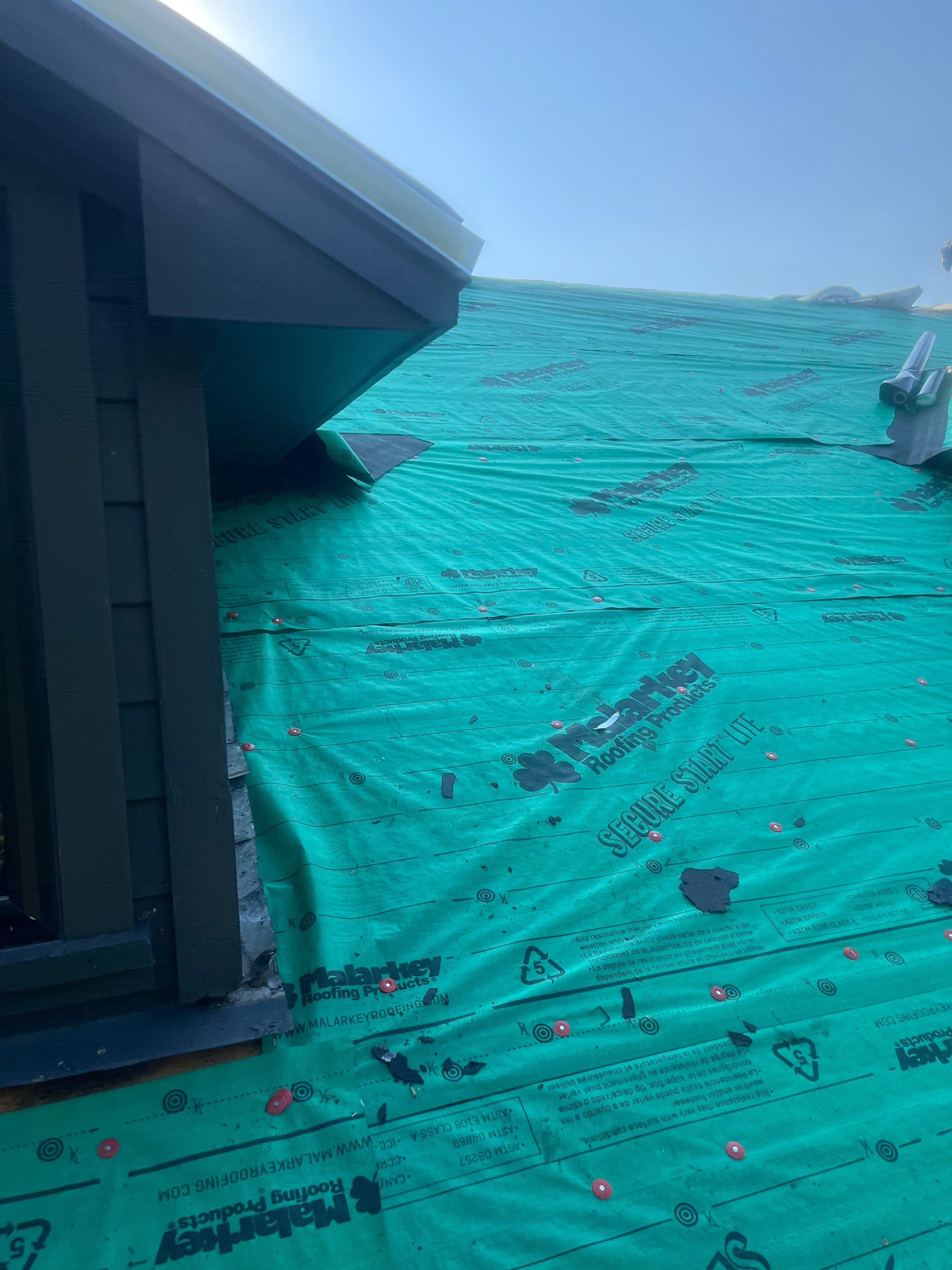 Reroof + Gutters by Berry Good Roofing 
