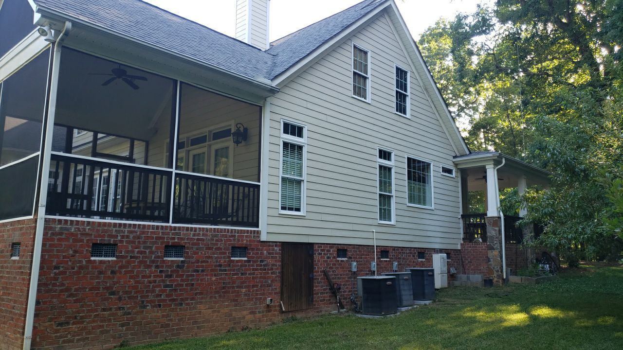 House Wash using cleaner by Power Wash Masters LLC