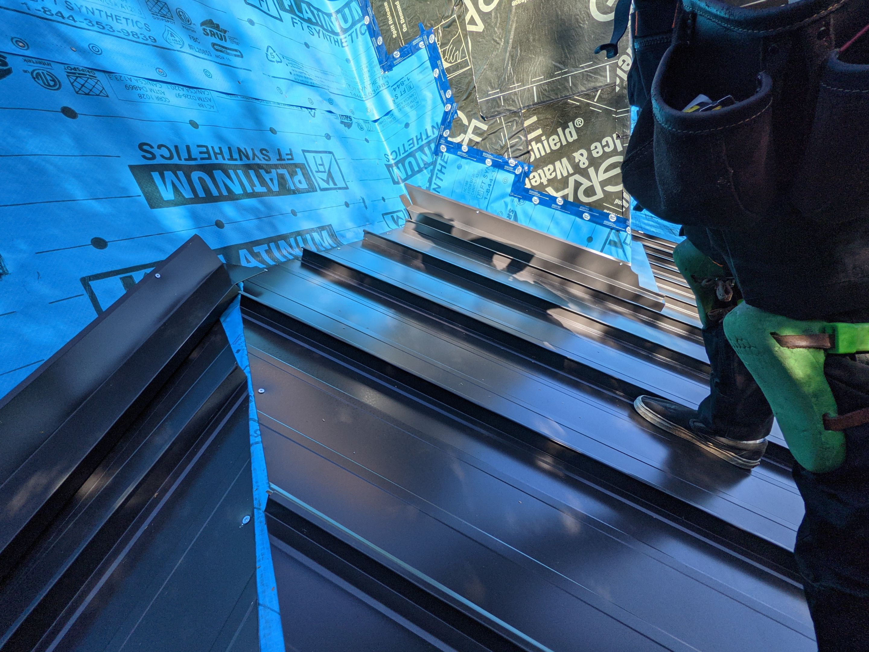 Residential Roofing Installation using 16" Standing Seam Panels by Jay Carter Roofing & Sheet Metal