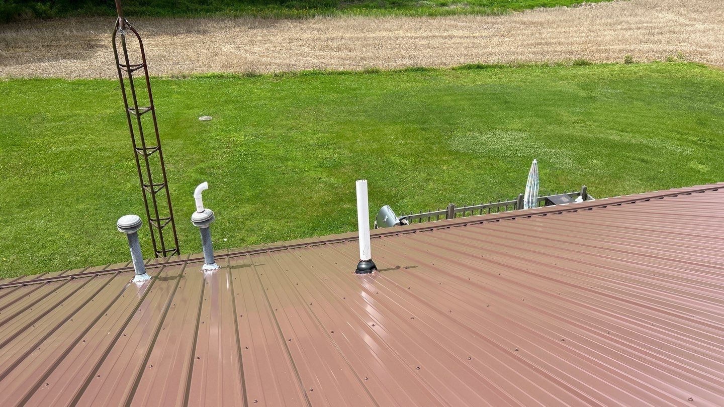 Residential Roofing Installation using Performance Panel Metal - Coca Brown by RoofX 
