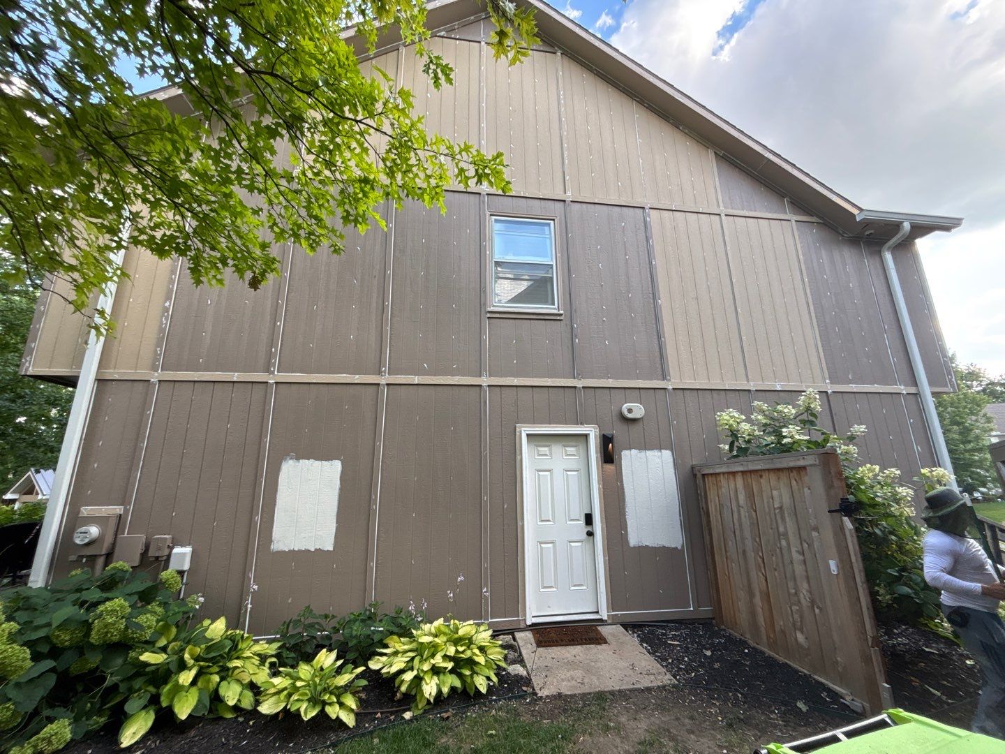 Shoji White Exterior Painting and Comprehensive Wood Rot Repair in Overland Park by Cougar Painting