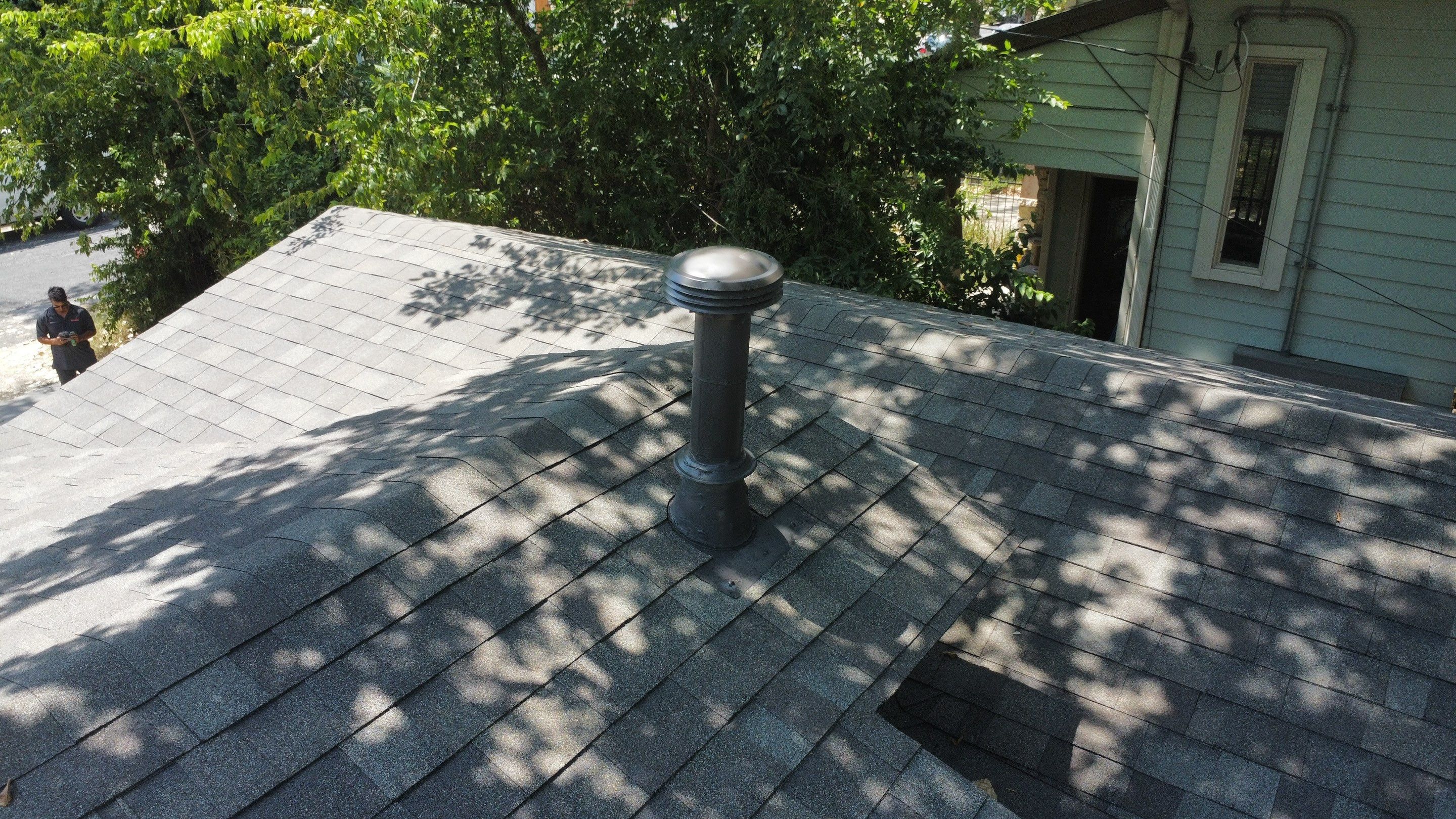 Mixed Roof System ā Oakridge Driftwood + Flat Roof Section | Austin, TX by Kstylez Roofing & Construction