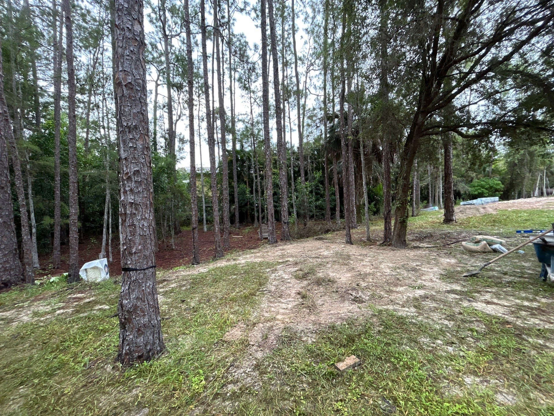 Fire pit and seating area/Oaks Blvd Naples by Old Town Pavers Llc