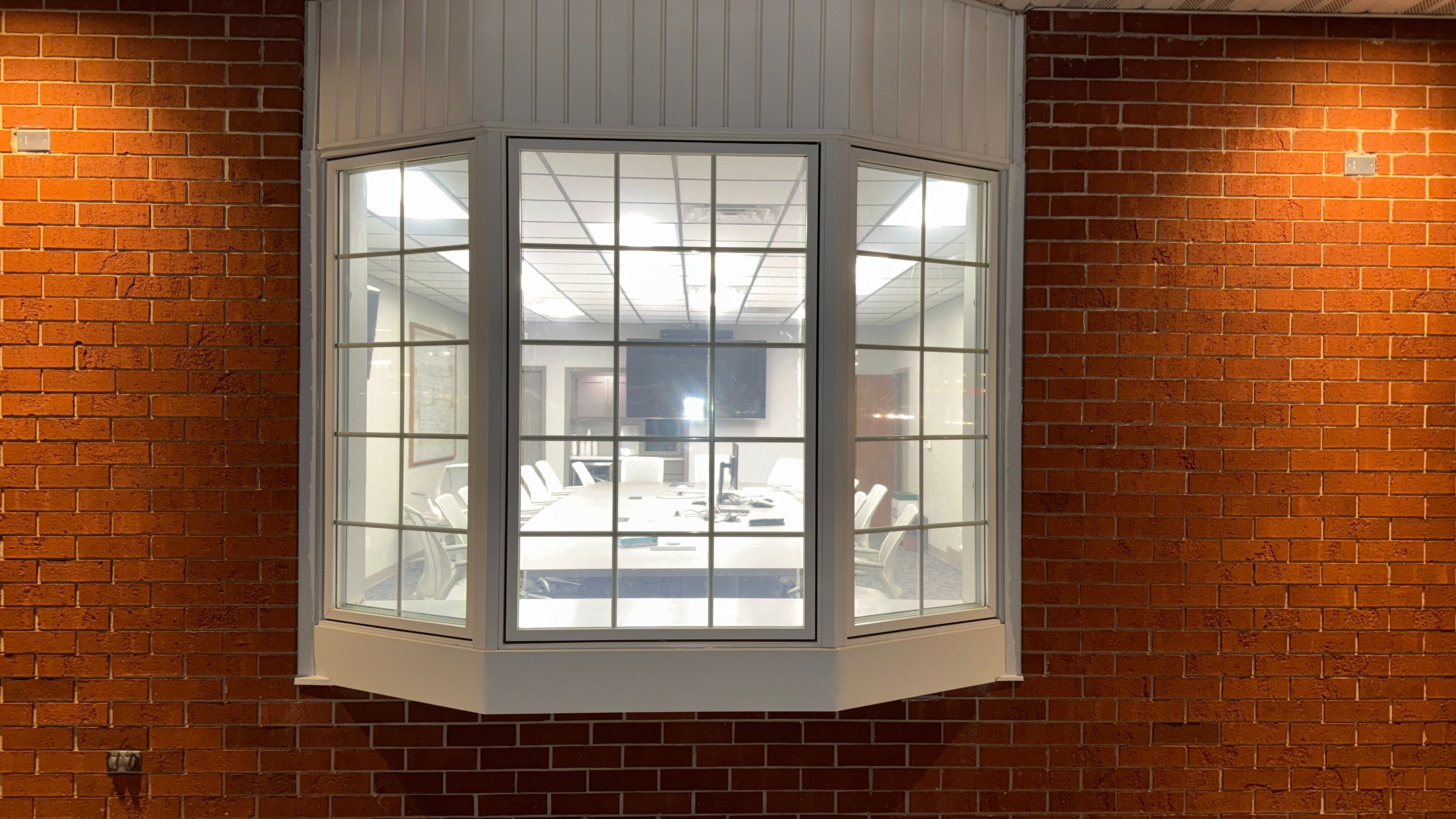 Pella Window installation using Pella Lifestyle wood/Aluminum window by United Windows and Siding LLC