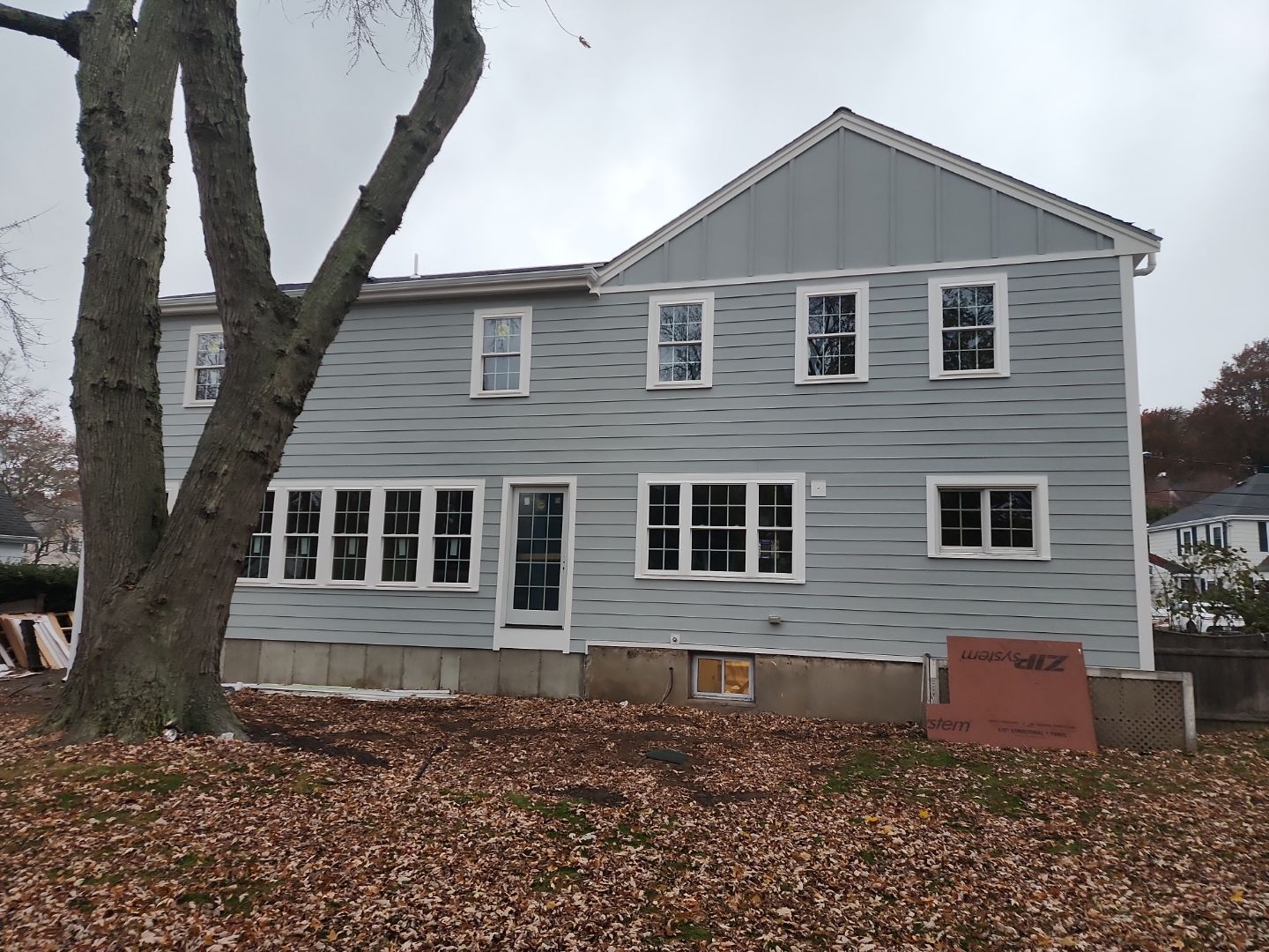 Siding and Roof for house with new addition in Milton, MA by UBrothers Construction