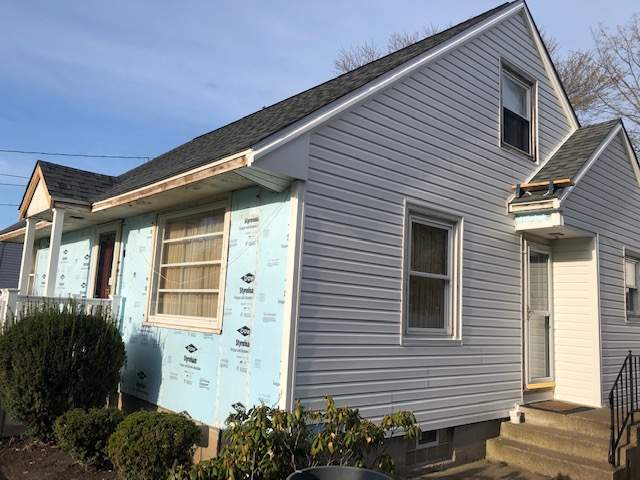 Exterior Renovations- Roofing, Siding, Concrete, and Railings  by Ivy Lea Construction
