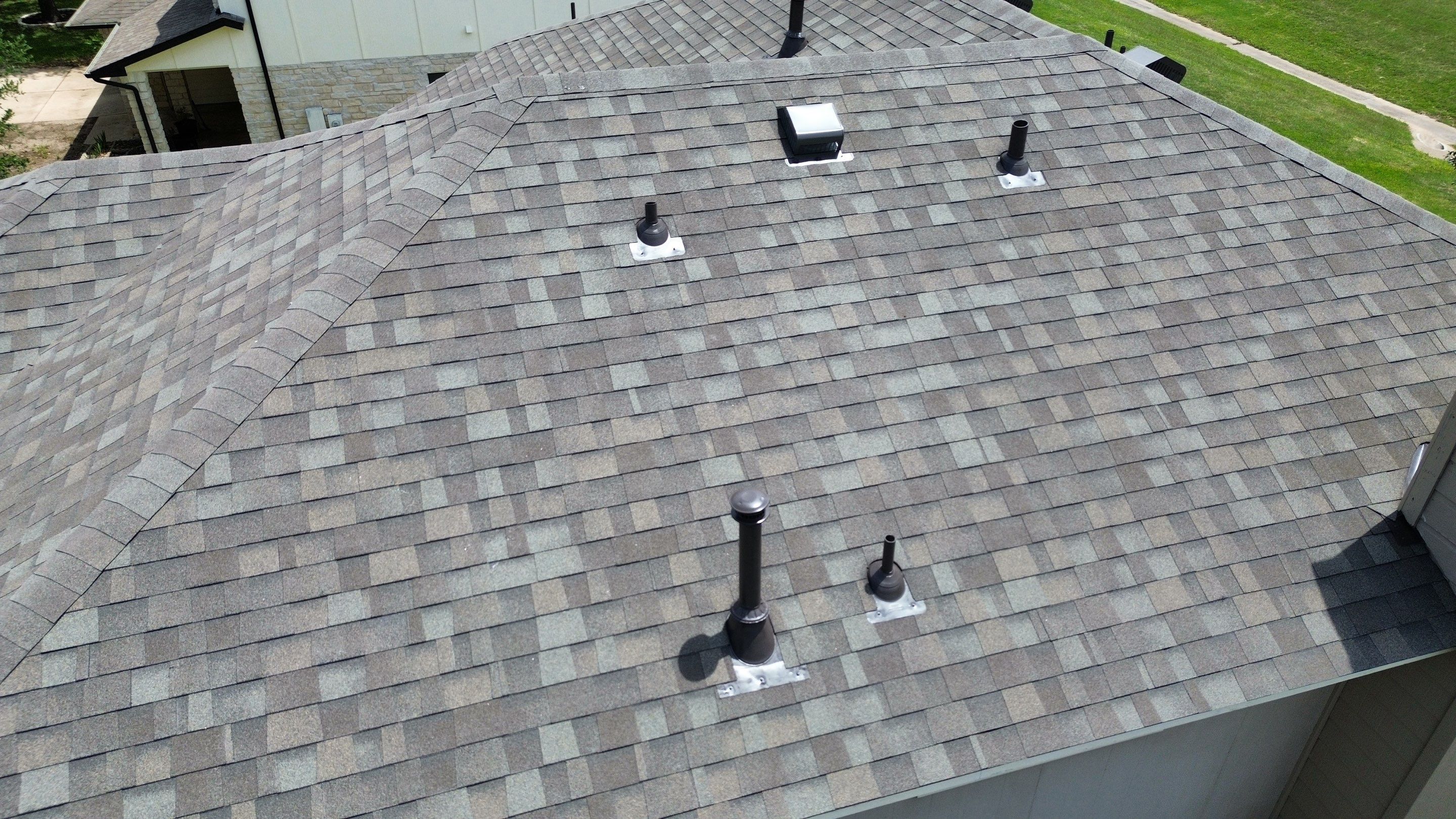 Roof Replacement & Chimney Cricket Upgrade in Cedar Park, TX by Kstylez Roofing & Construction