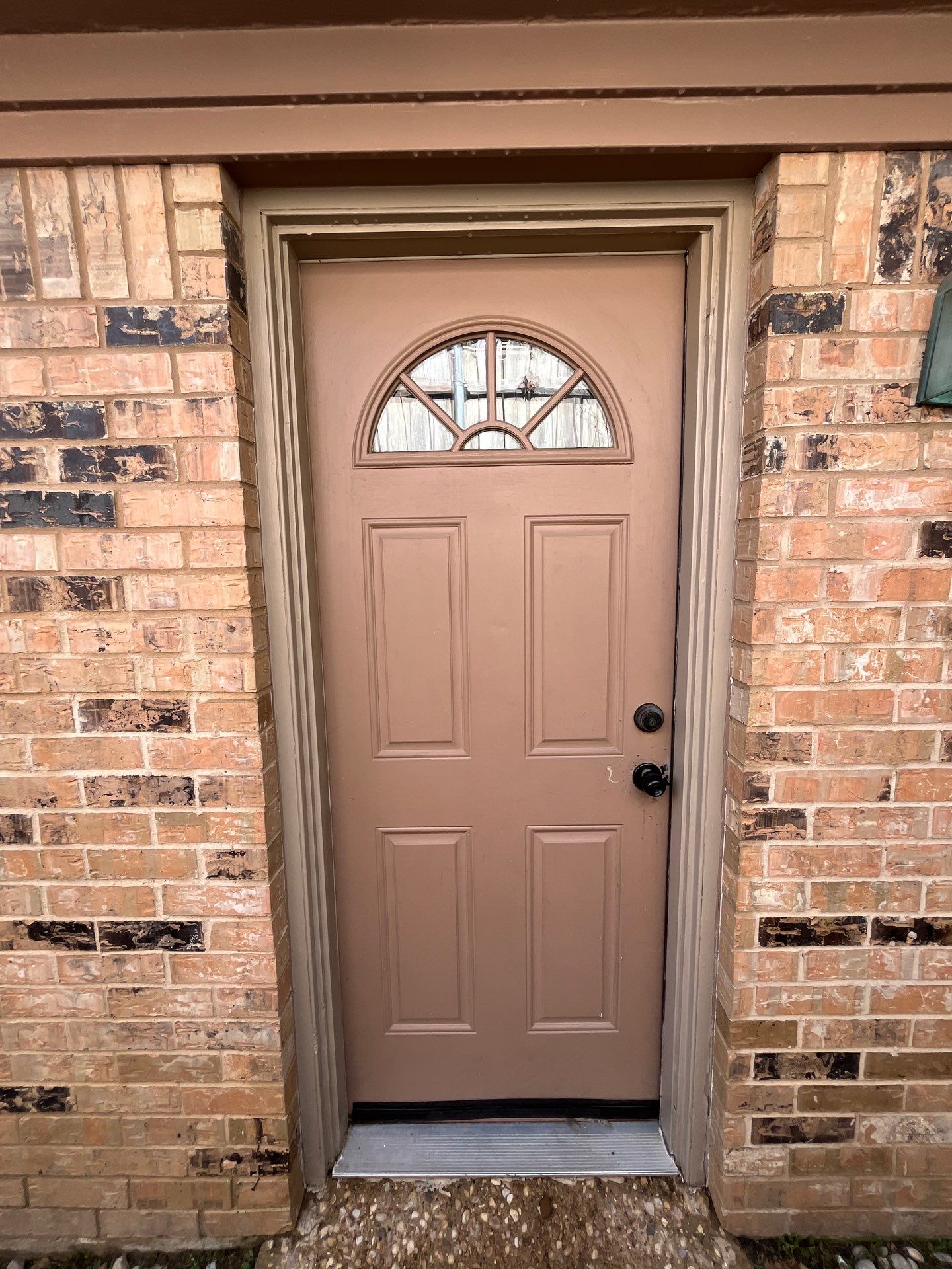 Exterior Painting in Tyler, TX | Eaves, Door & Columns in Elegant Black by Quality Coats Painting