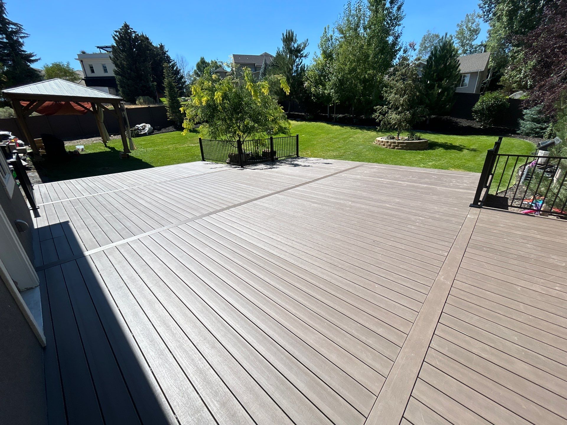 Deck Build Over Concrete Patio by SAGE Decks