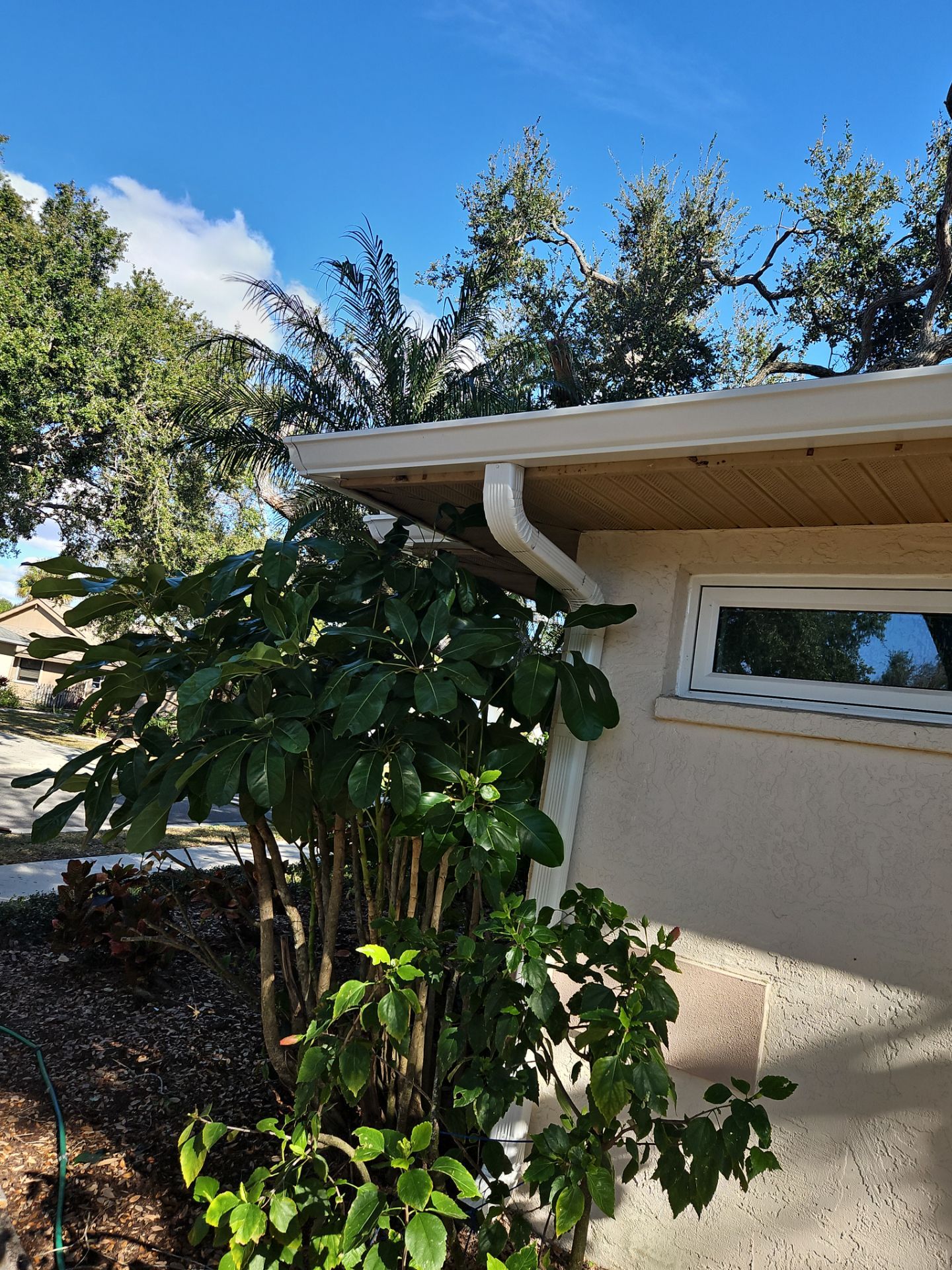 Seamless Aluminum Gutter Installation using 6 Inch Seamless Gutters in Sarasota FL by Gutter Professors