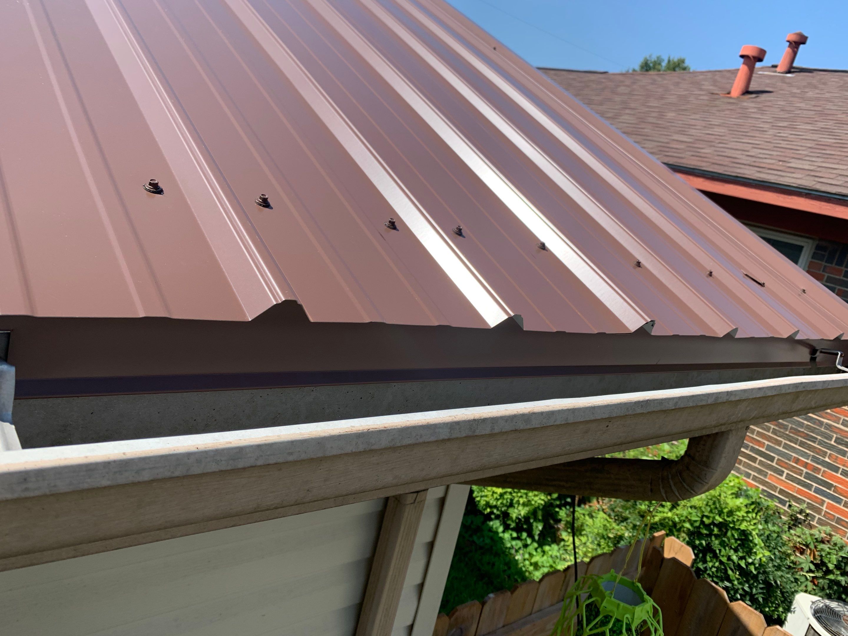 Residential Roofing Installation using 26 Gauge Metal by The Roofing Dudes